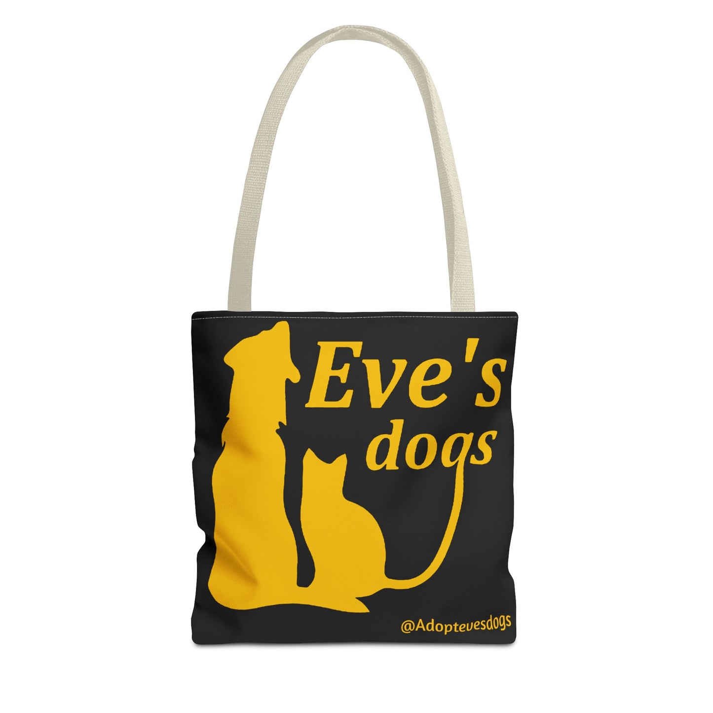 This is the Beige 13" x 13" Adopt Eve's Dog Tote Bag. This is the front image of the tote. The handles are beige. The top of the tote is hemmed in yellow. The tote is all over black with the image of a dog, cat, "Eve's Dogs" and "@Adoptevesdogs" in yellow. The tote is against an all white background.