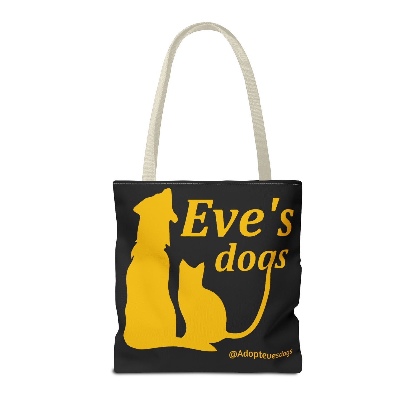 This is the Beige 16" x 16" Adopt Eve's Dog Tote Bag. This is the front image of the tote. The handles are beige. The top of the tote is hemmed in yellow. The tote is all over black with the image of a dog, cat, "Eve's Dogs" and "@Adoptevesdogs" in yellow. The tote is against an all white background.