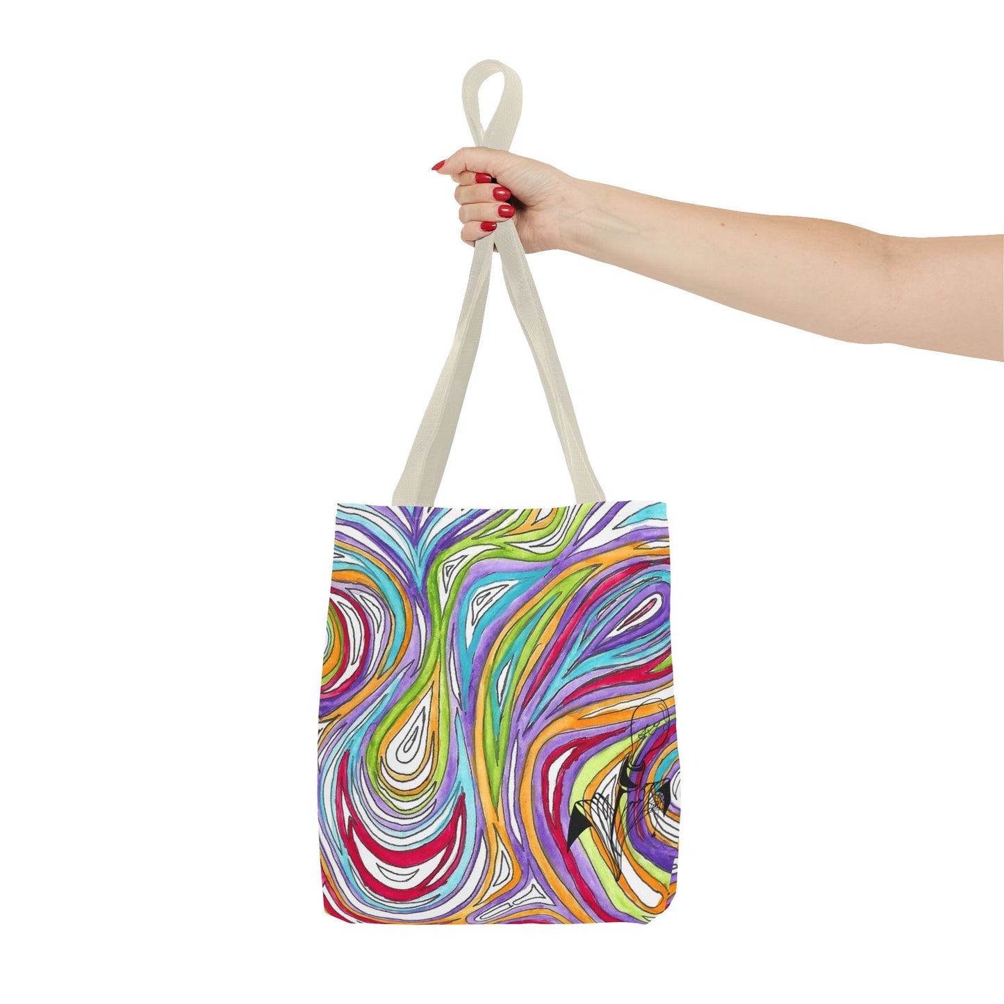 This is the Beige 13" x 13" Oil Spill Tote Bag by Storm Garden Studio. The tote has color matched straps, abstract colors and line work, all over print. The colors are lime green, orange, light blue, dark red, purple, white and black. Storm Garden Studio logo printed in black on bottom right of tote bag. A woman's upper arm from the left is shown and the hand is holding the handles. The tote is against a white background.