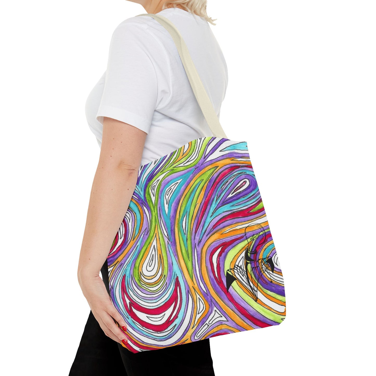 This is the Beige 16" x 16" Oil Spill Tote bag by Storm Garden Studios. A woman walking towards the left, short blonde hair, in white shirt, and black pants, one hand on the tote and carrying the bag with color matched straps that is 20" x 20", abstract colors and line work, all over print. The colors are lime green, orange, light blue, dark red, purple, white and black. Storm Garden Studio logo on bottom right of tote bag printed in black. She is against a white background.