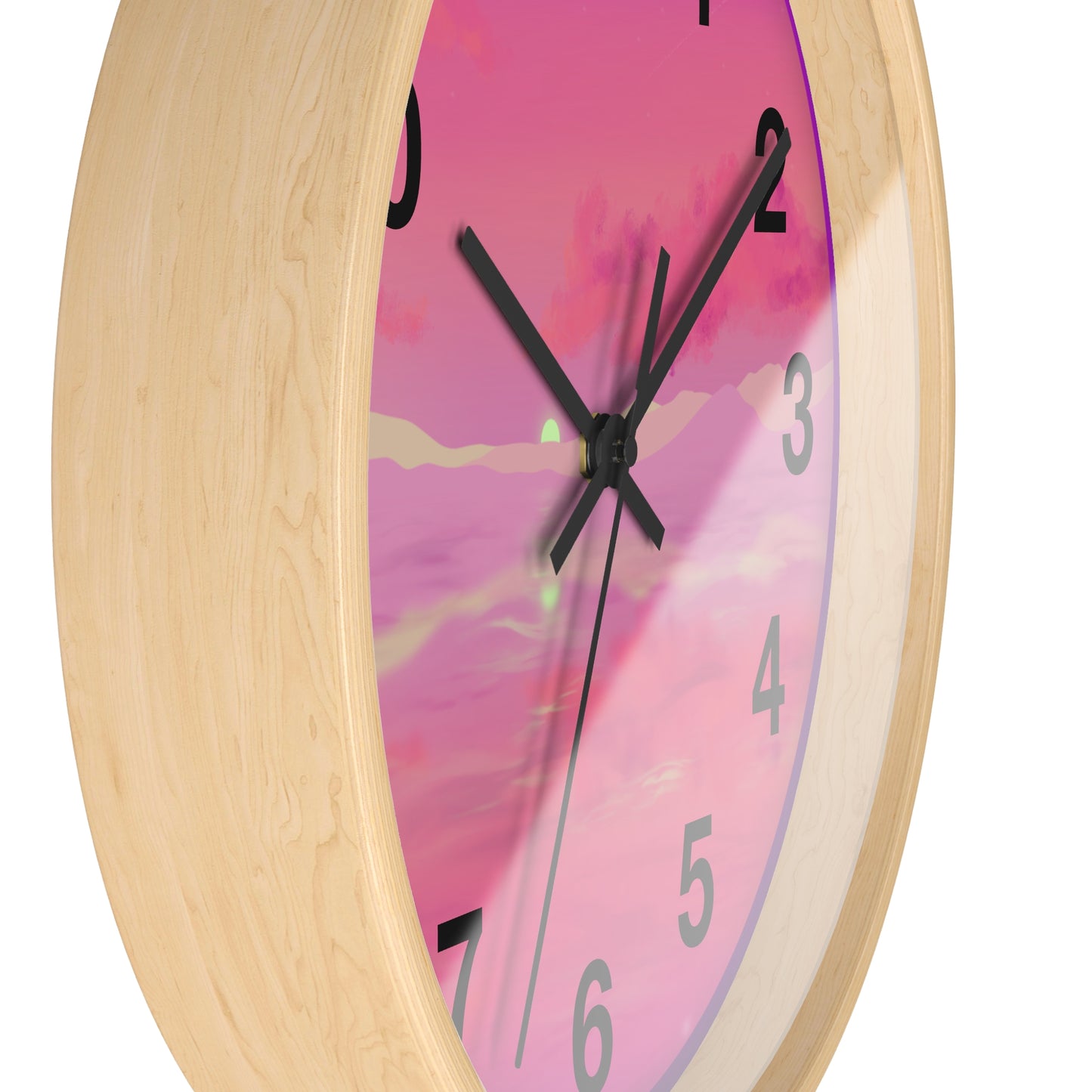 This is the 10" Wooden Base Pink Dreamscape Wall Clock with black hands by Lee Hansheng Studios.The image is from the side which shows the rim of the clock. There are two black clock hands, black numerals and the illustration behind it.The illustration has the sky and clouds. Different pinks and hues blended into the clouds and spreads outwards.There are dark purples on the side and yellows near the middle of the art piece. It is against a white background.