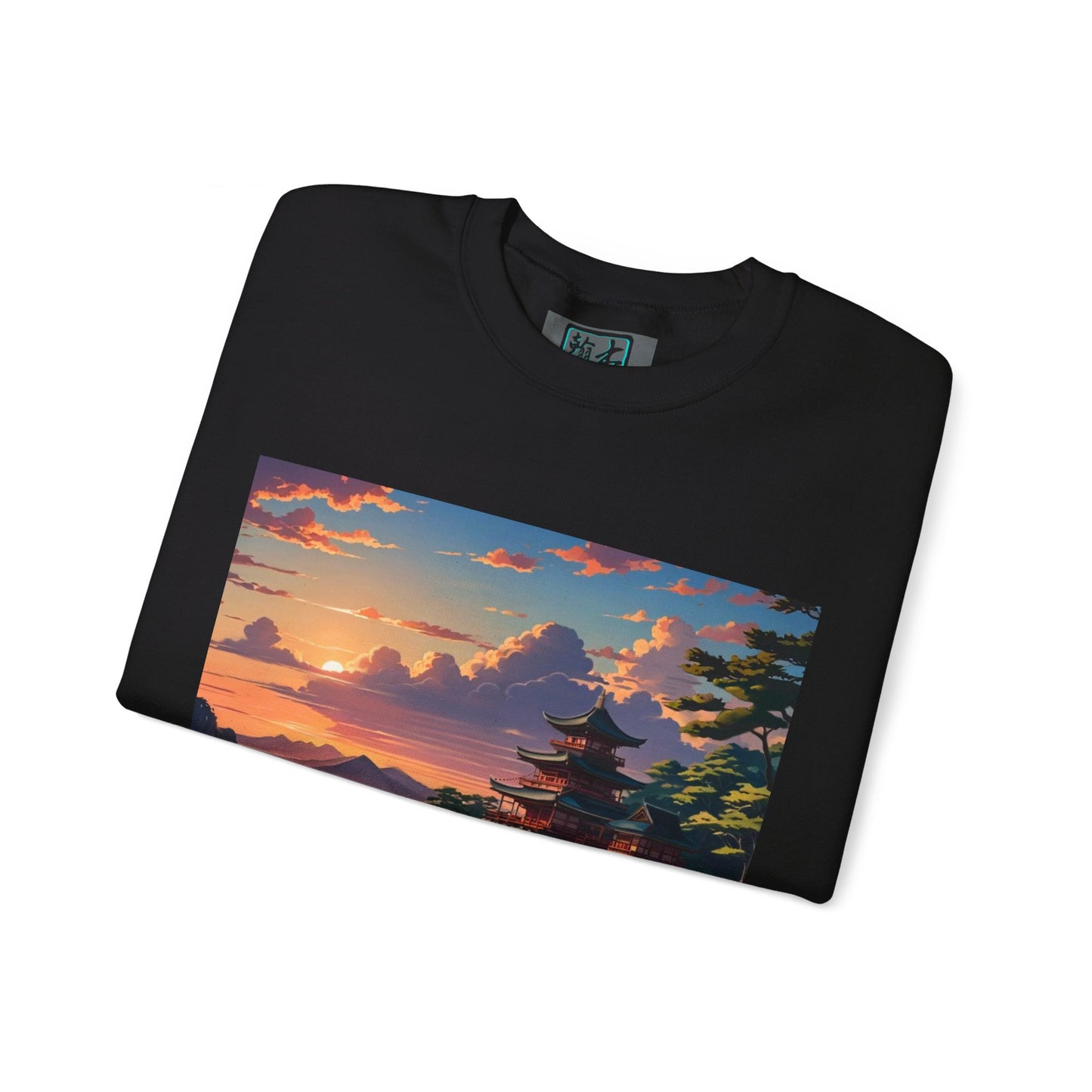 This is the Black Temple of Peace Sweatshirt by Lee Hansheng Studios. It comes in sizes S-5XL. This is an image of the sweatshirt from the front and folded. On the inside of the shirt there is a little of the studio's logo showing and the illustration shows the top of the landscape. There is a setting red/orange sun above clouds, one blue roof,brown/red walled temples on the right thre are some trees and mountains in the background scenery. The shirt is against a white background.