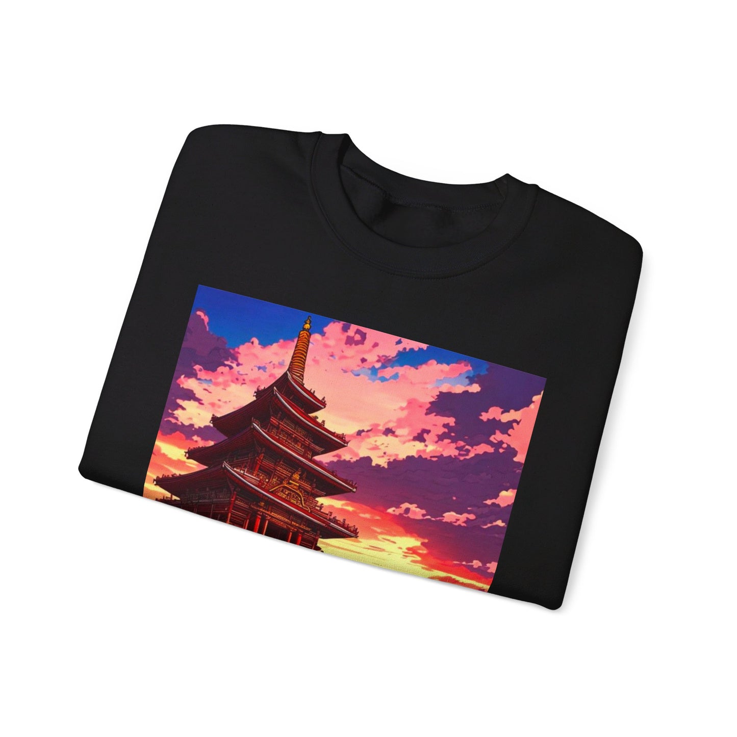 This is the Black Temple on the Sea Heavy Blend Crewneck Sweatshirt by Lee Hansheng Studios. This comes in sizes S-3XL. This is an image of the front of the sweatshirt folded. The illustration has a temple with 4 stories on the left. There are cloudy skies with a little bit of blue, white, red and pinks on the clouds. There is a little bit of the sunset peeking through behind the temple. It is yellow and red colors. The image of the sweatshirt is against a white background.