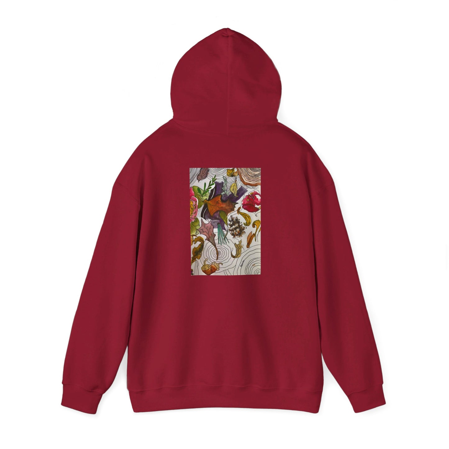 This is the Cardinal Red Fall is falling Heavy Blend Hooded Sweatshirt by Storm Garden Studio. It comes in sizes S-5XL. The image is from the back with the hood up to show the shoulder area. The drawstring is color matched. The illustration is within a rectangle starting from the upper back to mid back. There are various conifers like leaves,pine cones,etc. There are also some flowers and a tree trunk ring.The colors are red, yellow, dark brown, purples, and green. It is against from a white background.