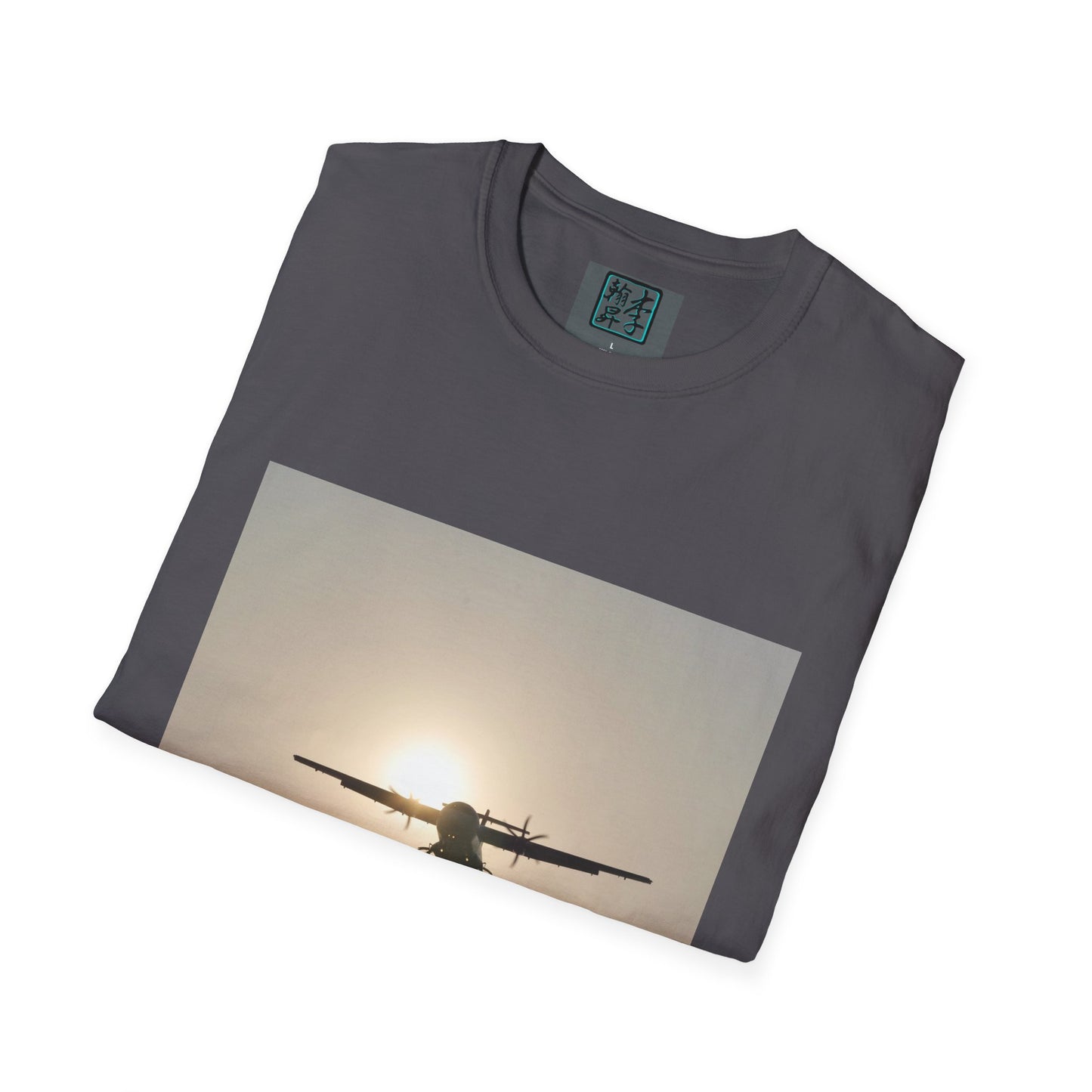 This is the Charcoal Landing T-Shirt by Lee Hansheng Studios. This is an image of the front folded. On the inside of the shirt is the logo for the studio printed in black outlined in blue, gray size label with the print being white. The illustration is a rectangular design of an airplane landing. There is an orange/yellow sun with the shadowed plane. The shirt is against a white background.