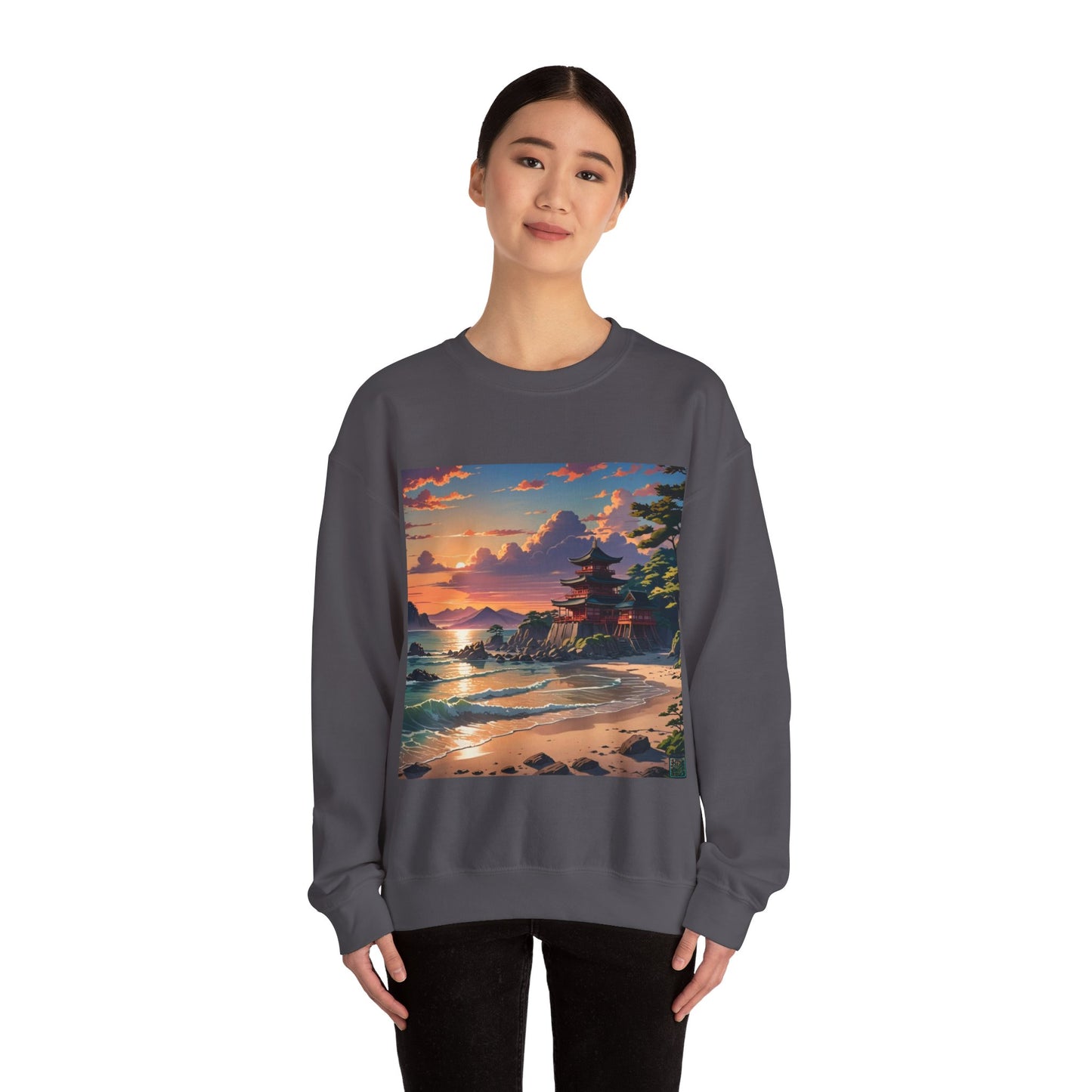 This is the Charcoal Temple of Peace Sweatshirt by Lee Hansheng Studios. It comes in sizes S-5XL. The illustration shows a setting red/orange sun above clouds,two blue roof,brown/red walled temples on the right on top of the hills,mountains,blue/white waves into sand and a forest to the right.On the bottom right corner is the logo printed in black for the studio and outlined in blue. A smiling lady, head tilted and is standing forward with the sweatshirt and black pants.