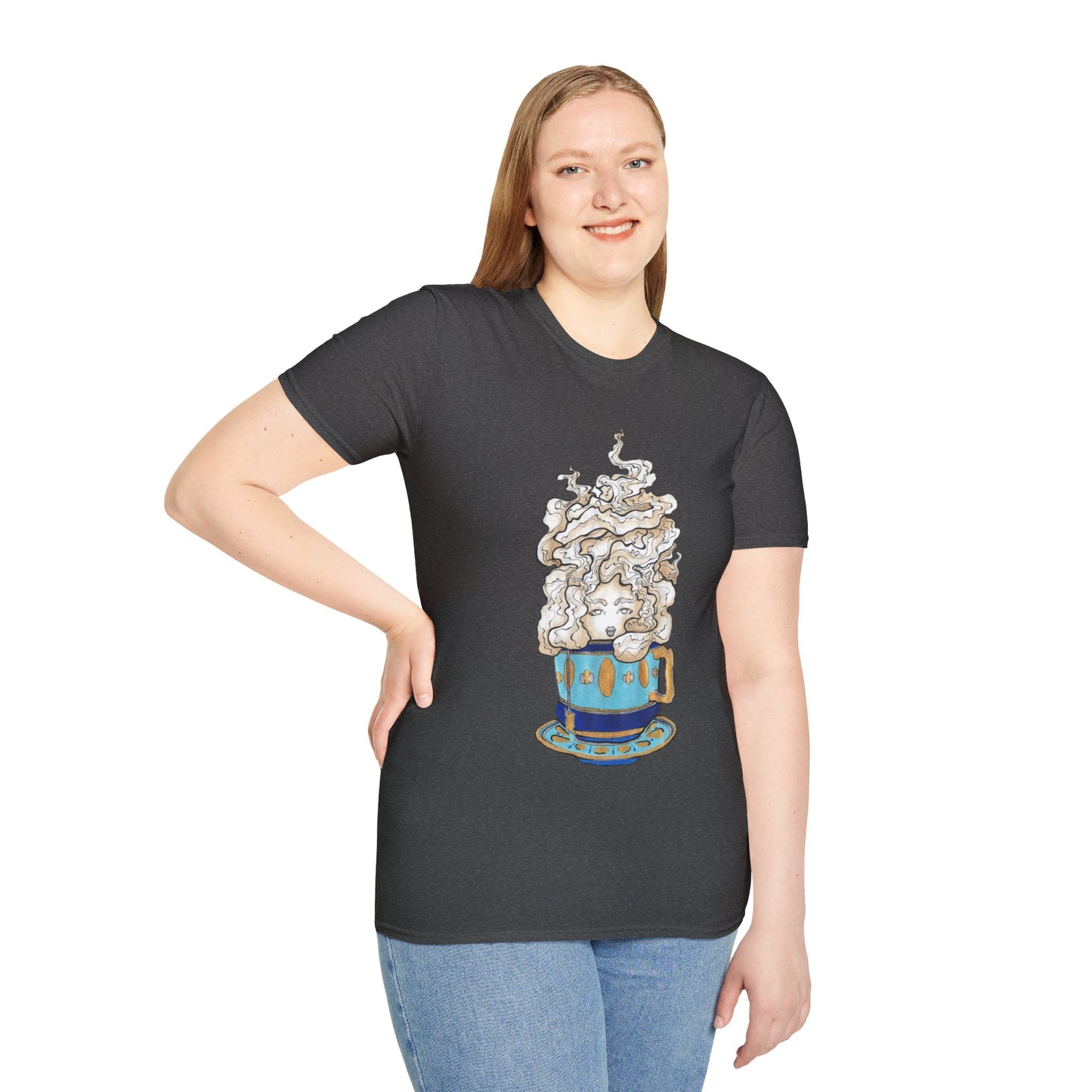 This is the Dark Heather Earl Grey Softstyle T-Shirt by Chris Foster Design. It comes in sizes XS-5XL. The illustration is of a gold, light blue and dark blue teacup with a tan, yellow and white steam. The steam is swirly and goes up and outwards. In the middle is a lady's face. A smiling lady facing the front with her head tilted slightly to the left, hair behind shoulders, right hand on waist, other hand hanging naturally and is wearing dark jeans and the designed t-shirt.