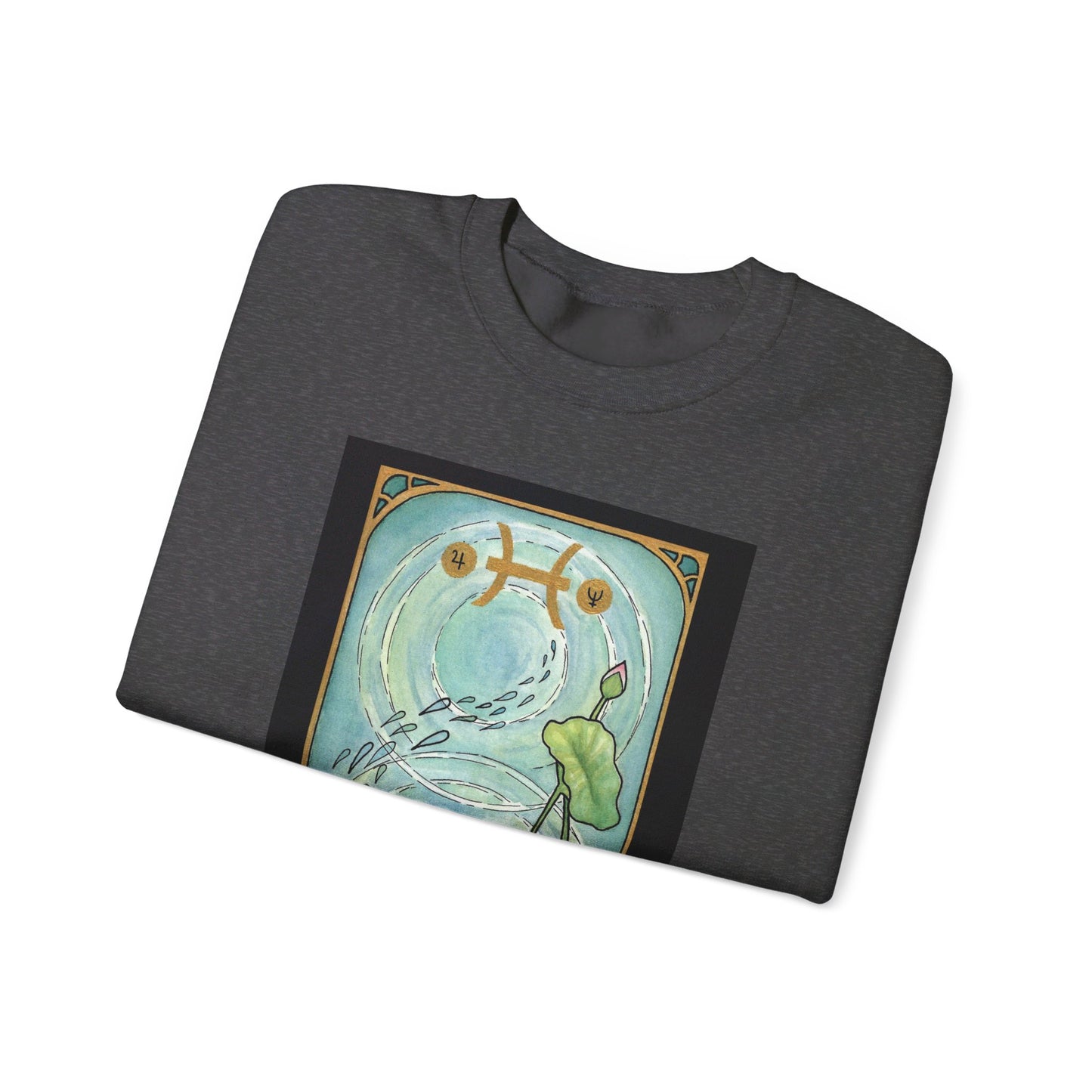 This is the Dark Heather Pisces Sweatshirt by Chris Foster Design that comes in sizes S-3XL and illustration starts from the upper chest till below the belly button. This is an image of the front of the sweatshirt folded. What can be seen is the beginning of tarot card with a gold intricate border and pisces symbol. In the background a pond that has one circular ripple, the right side has the lily flowers growing upwards with one green leaves, one pink bud and a green trail of seeds.