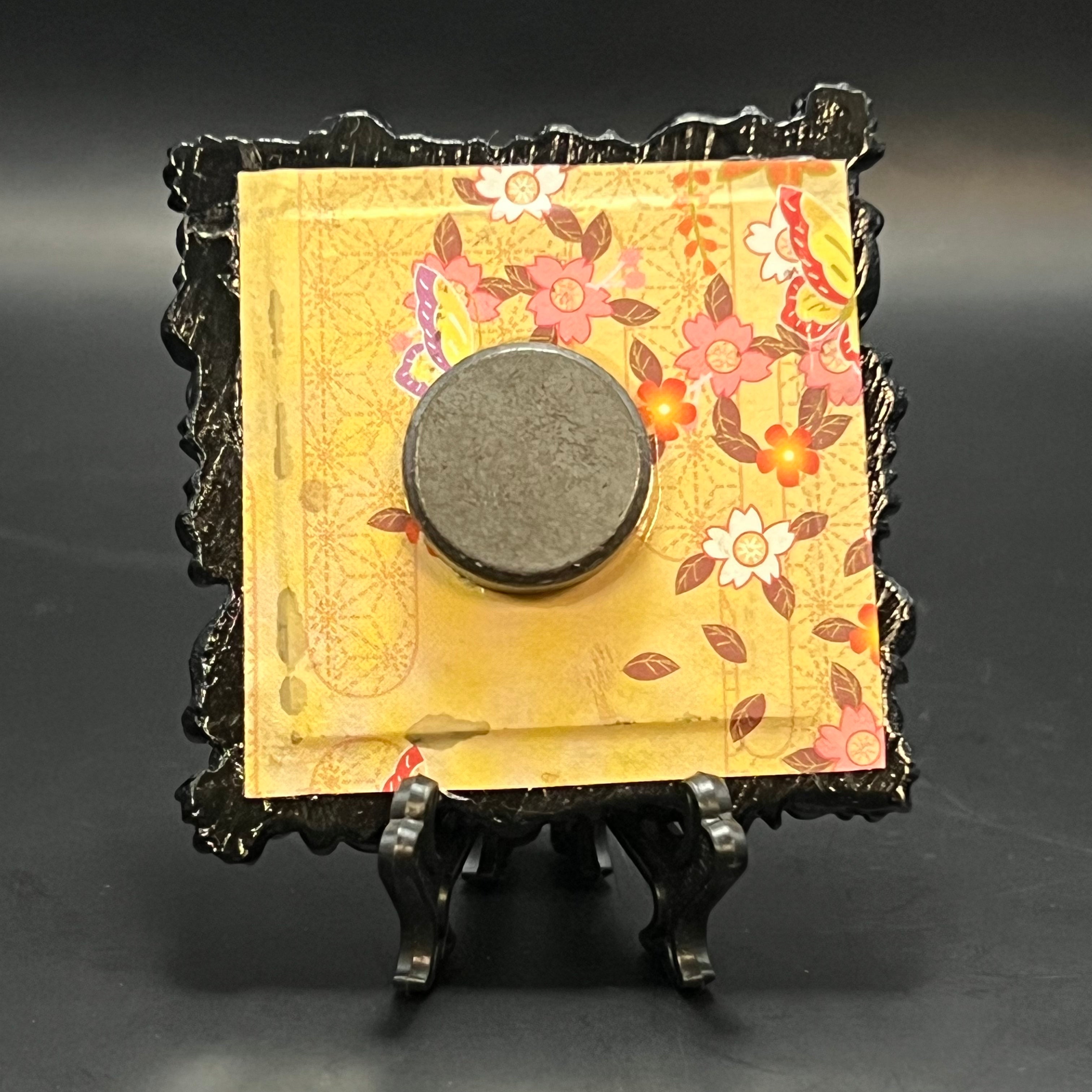 Close-up of the miniature painting’s textured blue mushroom cap with visible brushstrokes and detailed canvas weave.