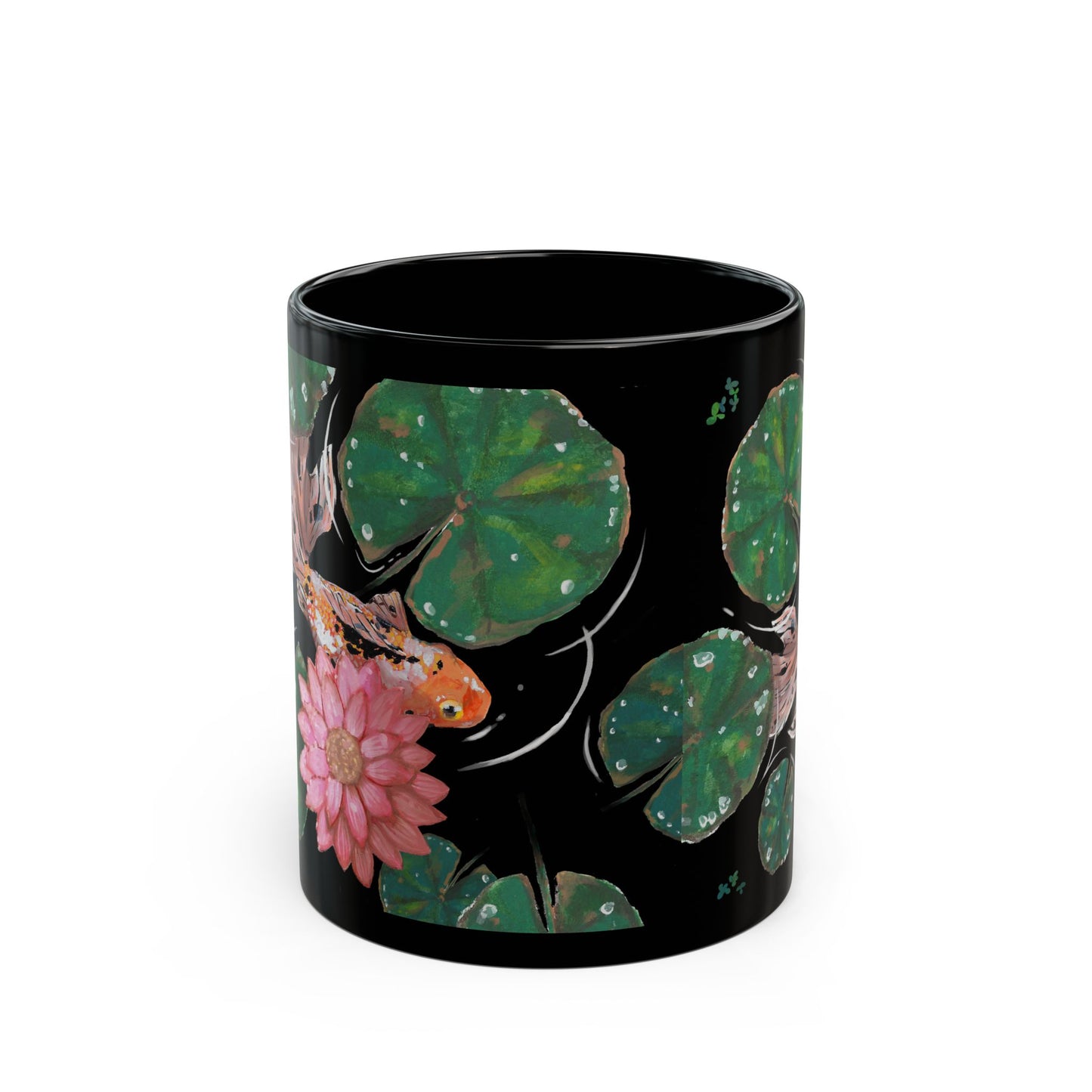 This is the 15 oz Goldfish Mug designed by Chris Foster Design. The image is shown from the front with all around print. There are six green lily pads of different sizes with water droplets reflected in clear/white. There are small green foilages all around. There is a speckled white, orange and black goldfish on the far left swimming under a pink lily flower. The water ripples and is clear matching the color of the mug which is black. The mug is ceramic with a glossy finish.