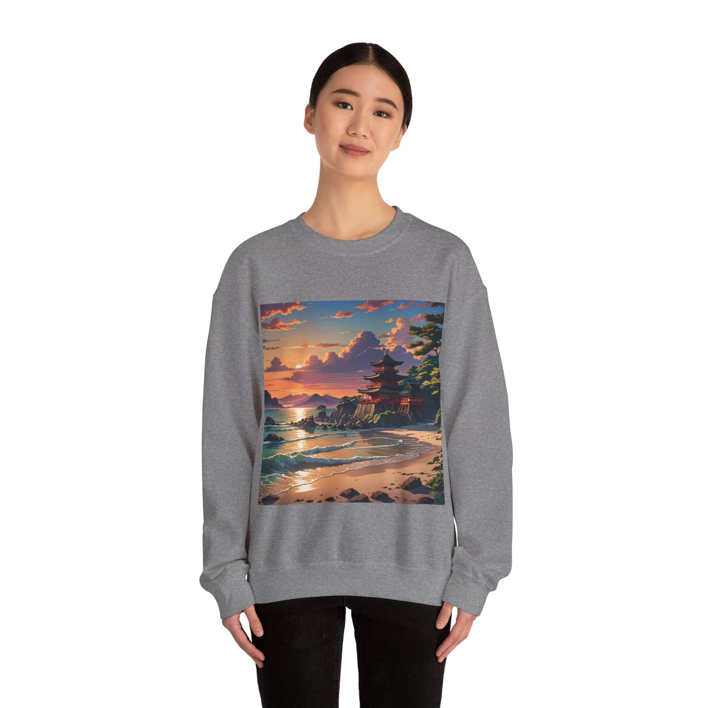 This is the Graphite Heather Temple of Peace Sweatshirt by Lee Hansheng Studios. It comes in sizes S-5XL. The illustration shows a setting red/orange sun above clouds,two blue roof,brown/red walled temples on the right on top of the hills,mountains,blue/white waves into sand and a forest to the right.On the bottom right corner is the logo printed in black for the studio and outlined in blue. A smiling lady, head tilted and is standing forward with the sweatshirt and black pants.