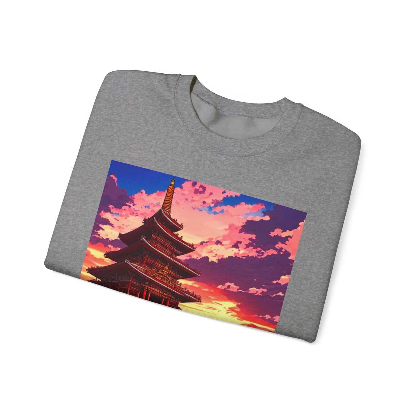 This is the Graphite Heather Temple on the Sea Heavy Blend Crewneck Sweatshirt by Lee Hansheng Studios. This comes in sizes S-3XL. This is an image of the front of the sweatshirt folded. The illustration has a temple with 4 stories on the left. There are cloudy skies with a little bit of blue, white, red and pinks on the clouds. There is a little bit of the sunset peeking through behind the temple. It is yellow and red colors. The image of the sweatshirt is against a white background.