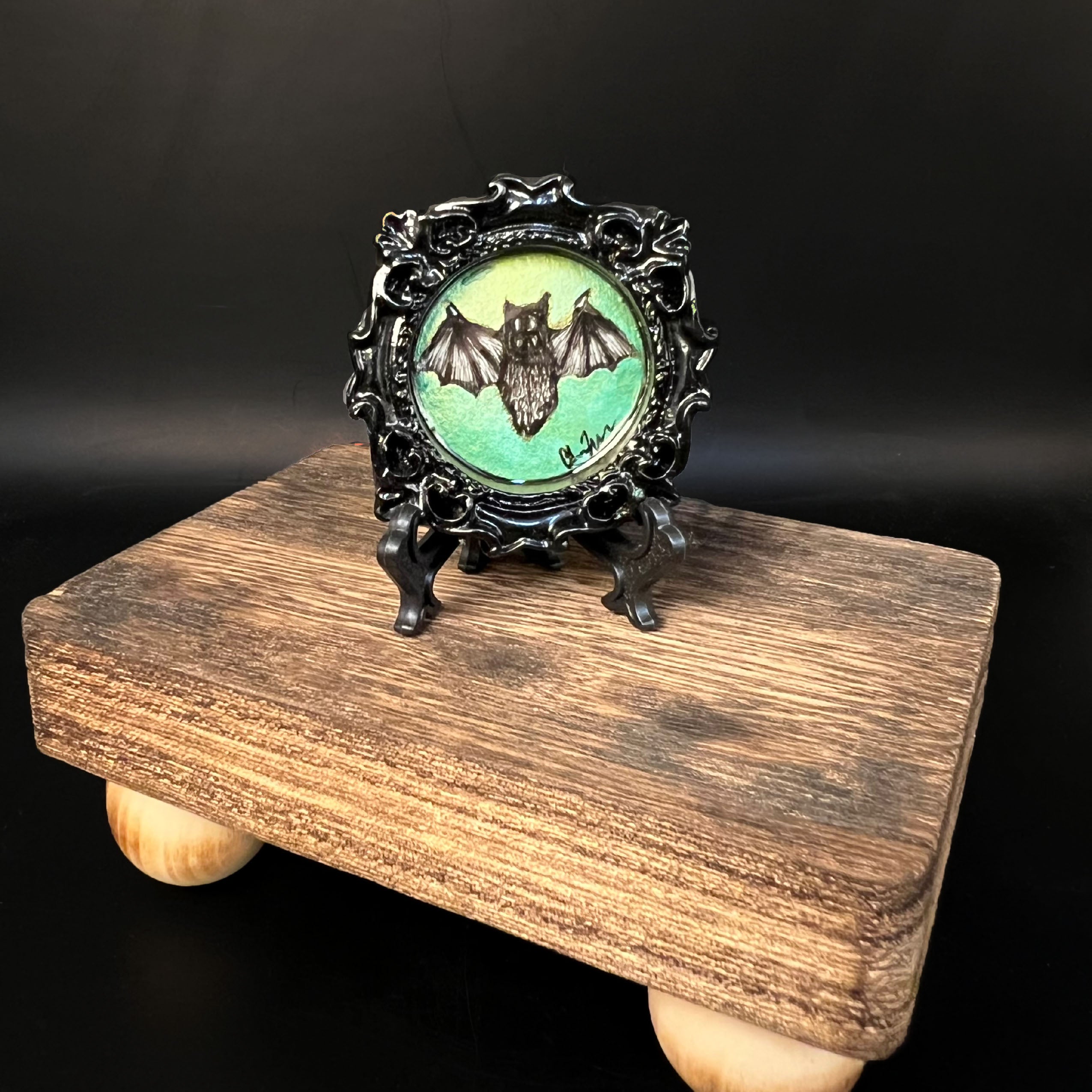 CFD Green Bat miniature painting by Chris Foster Design, acrylic media, 2x2 inches, framed, edition number 5 of 50