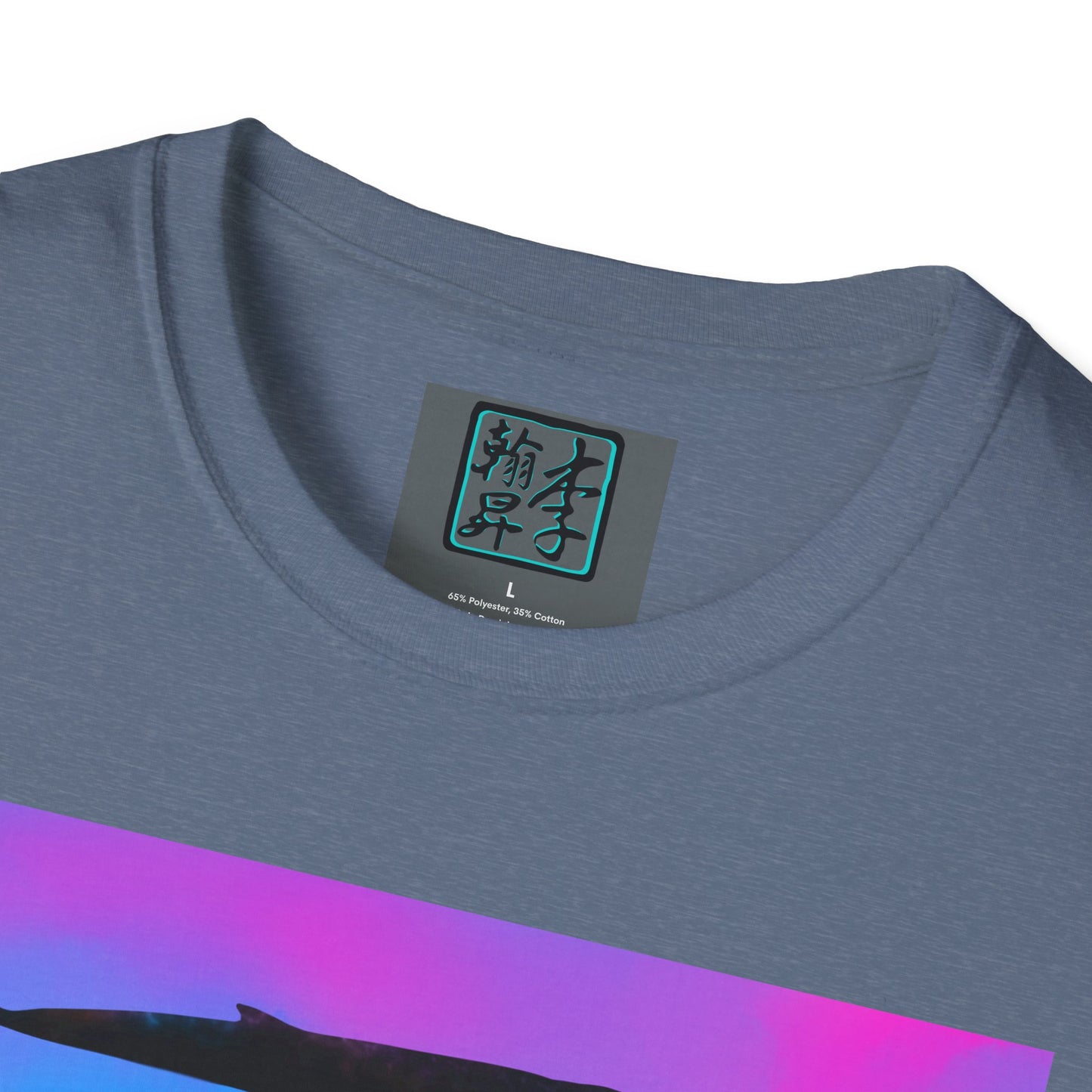 This is the Heather Indigo Into the Abyss Softstyle T-Shirt by Lee Hansheng Studios. This shows a close up of the front where the neck is. The illustration is underwater seascape with aquatic plants on a marbled background. What can be seen is a blue whale with a mix of colors of purple, pink and blue. The inside of the shirt has a gray label with the studio logo and the size label underneath printed in white. The shirt is against a white background.
