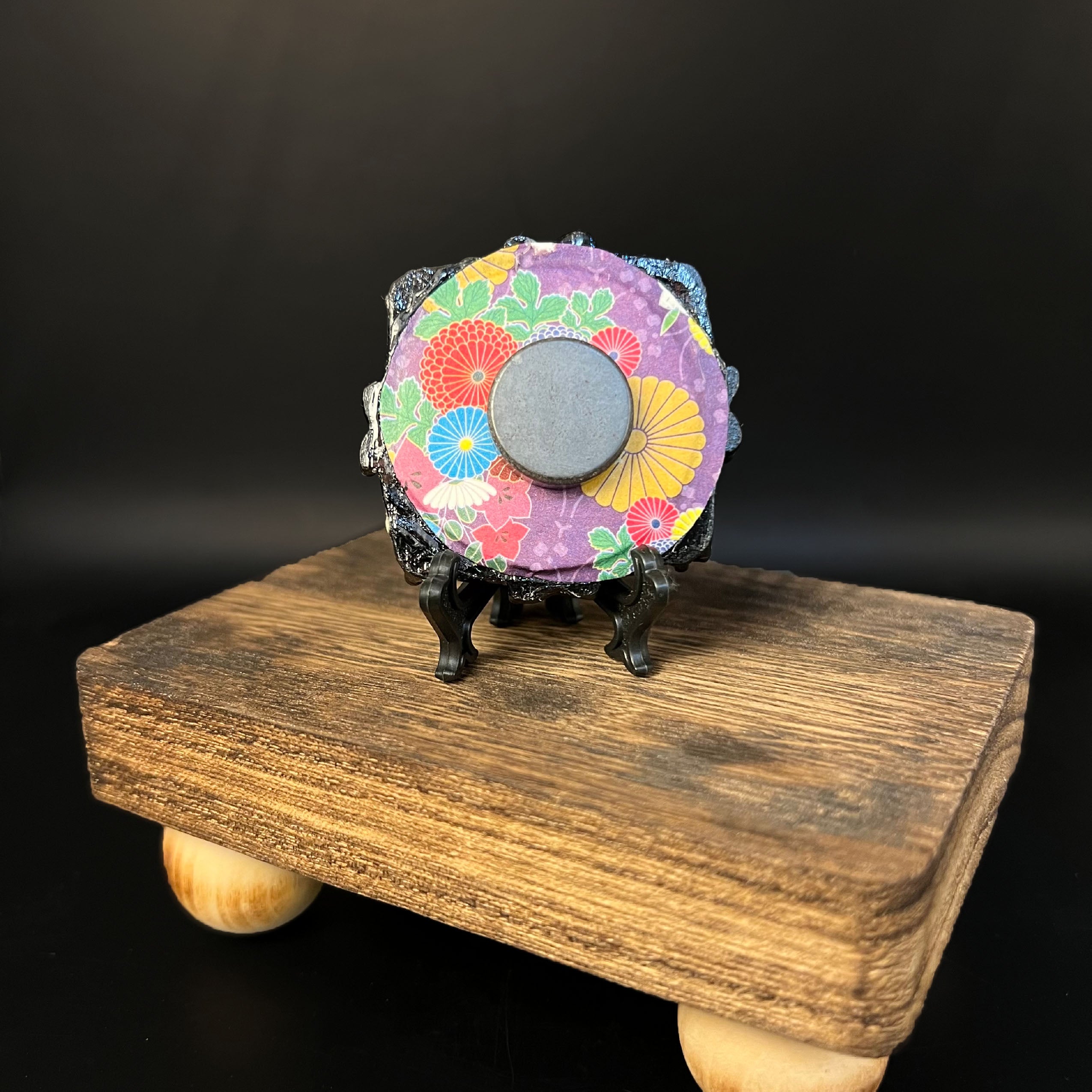 Close-up of the lantern’s textured metal surface and intricate engraving detailing on the side panel.