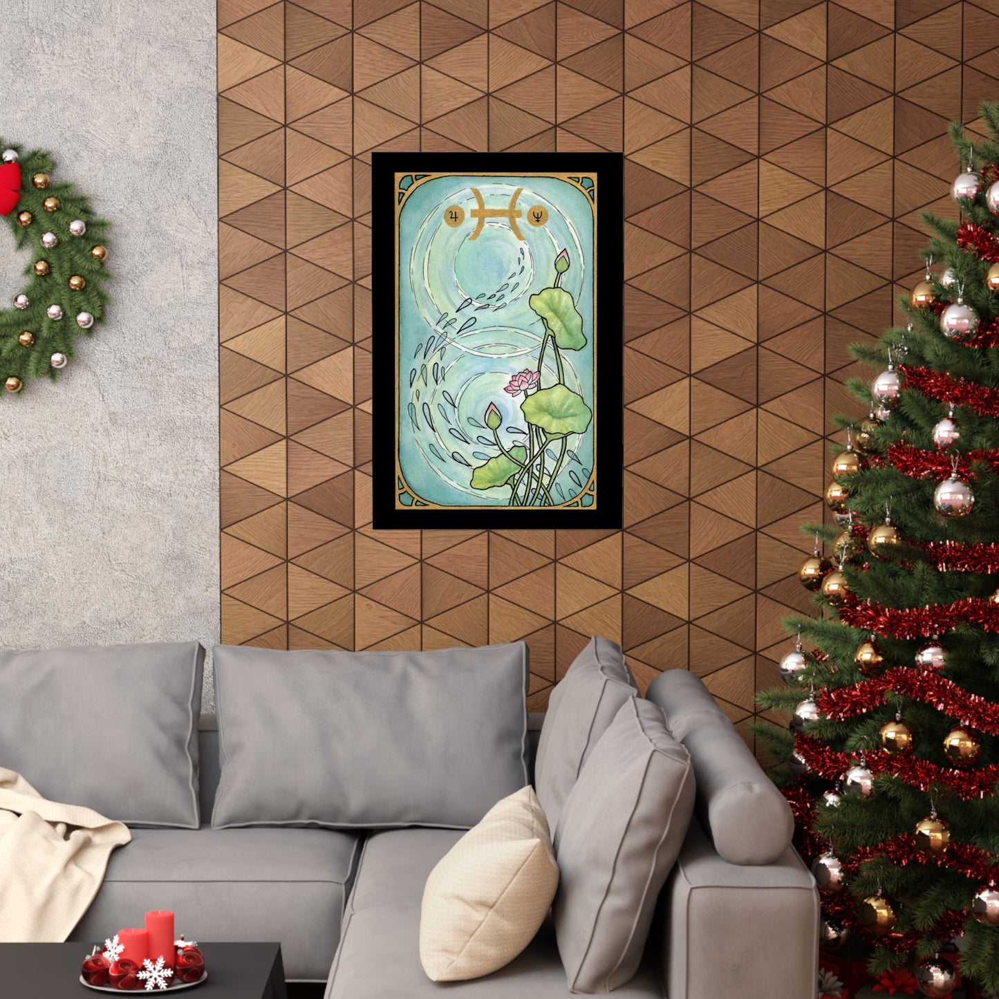 This is the Matte 24" x 36" Pisces Poster by Chris Foster Design.The illustration is designed like a tarot card,has a black border,gold frame, a pond,two circular ripples of water,1 bloomed flower,2 buds and 3 leaves combined trailing up on the right with seeds running down the pond,Pisces symbols on the top in gold.Poster is on a wood colored triangle design wall,wreath to the left on textured white wall, Christmas tree to the right,gray sofa below,beige pillow/blanket,black coffee table and red candles.