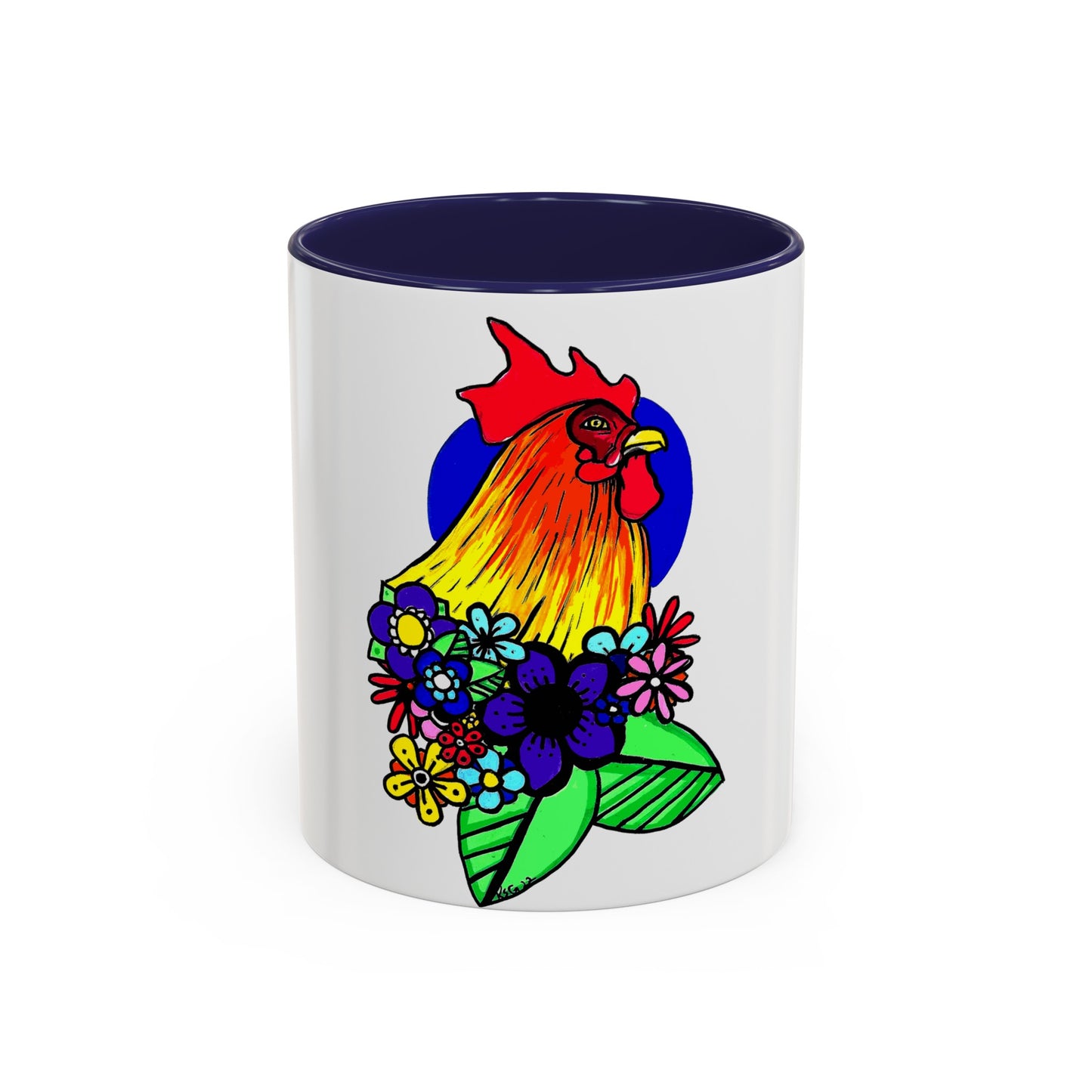 This it the Navy 11 oz Cock Accent Coffee Mug by Storm Garden Studio. This image showcases the front of the mug. The illustration is of a rooster with a dark blue circular background. The rooster is adorned with flowers on the bottom of its neck. It is bright green, dark blue, yellow, orange and pink. The rooster is bright red and fades into yellow. The mug is against a white background.