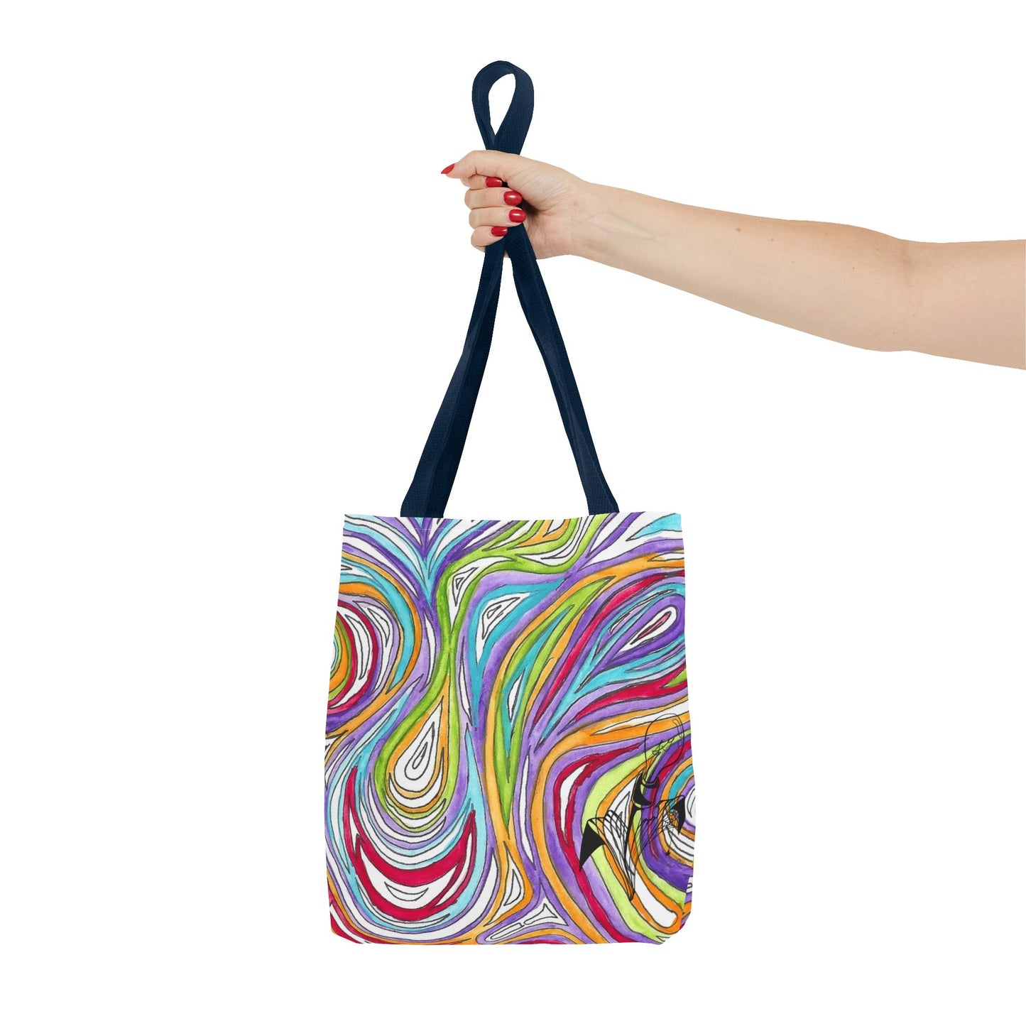 This is the Navy 13" x 13" Oil Spill Tote Bag by Storm Garden Studio. The tote has color matched straps, abstract colors and line work, all over print. The colors are lime green, orange, light blue, dark red, purple, white and black. Storm Garden Studio logo printed in black on bottom right of tote bag. A woman's upper arm from the left is shown and the hand is holding the handles. The tote is against a white background.