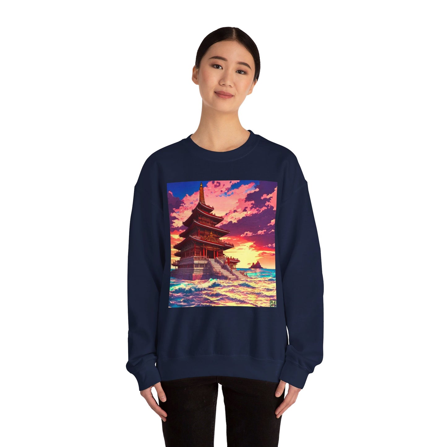 This is the Navy Temple on the Sea Heavy Blend Crewneck Sweatshirt by Lee Hansheng Studios.This comes in sizes S-3XL.This is an image of the front of the sweatshirt.A lady with black hair tied,a smile,black pants and hands on her sides. The illustration has a temple with 4 stories on the left surround by crashing waves of the sea,mountains on the right in the background. The Lee Hansheng logo is on the bottom right on the illustration outlined in blue. The colors are a mix of blues, pinks, reds and yellows.