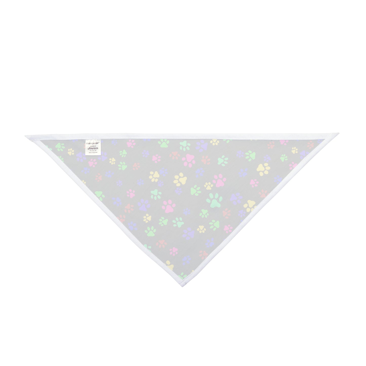 This is the 27" x 13" Paws on Paws Pet Bandana. This shows bandana from the back. There is a tag showcasing the brand EVERGREEN, printed in America, Phoenix, AZ and 100% polyester. The inside is lined in white and the rest is white where you can barely see the design on the other side. The design shows a triangle shape with different sized color paws on the design. The colors are yellow, green red, blue and purple on a black background. The bandana is against a white background.
