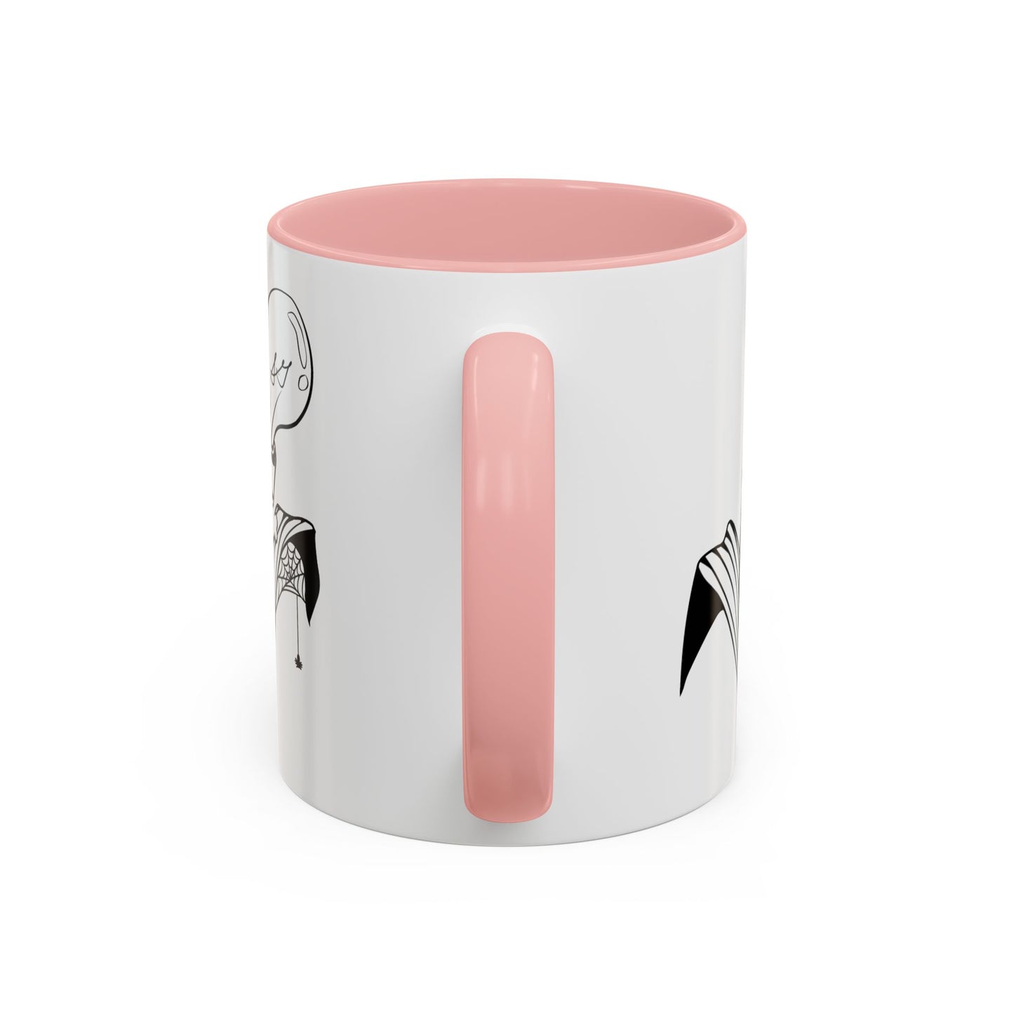 This is the Pink 11oz Storm Garden Studio Accent Coffee Mug. This is an image from the handle that is color matched with the inside of the mug. On the left side a little bit of the leaf and lightbulb print can be seen. On the right only a little bit of the leaf can be seen. It is against a white background.