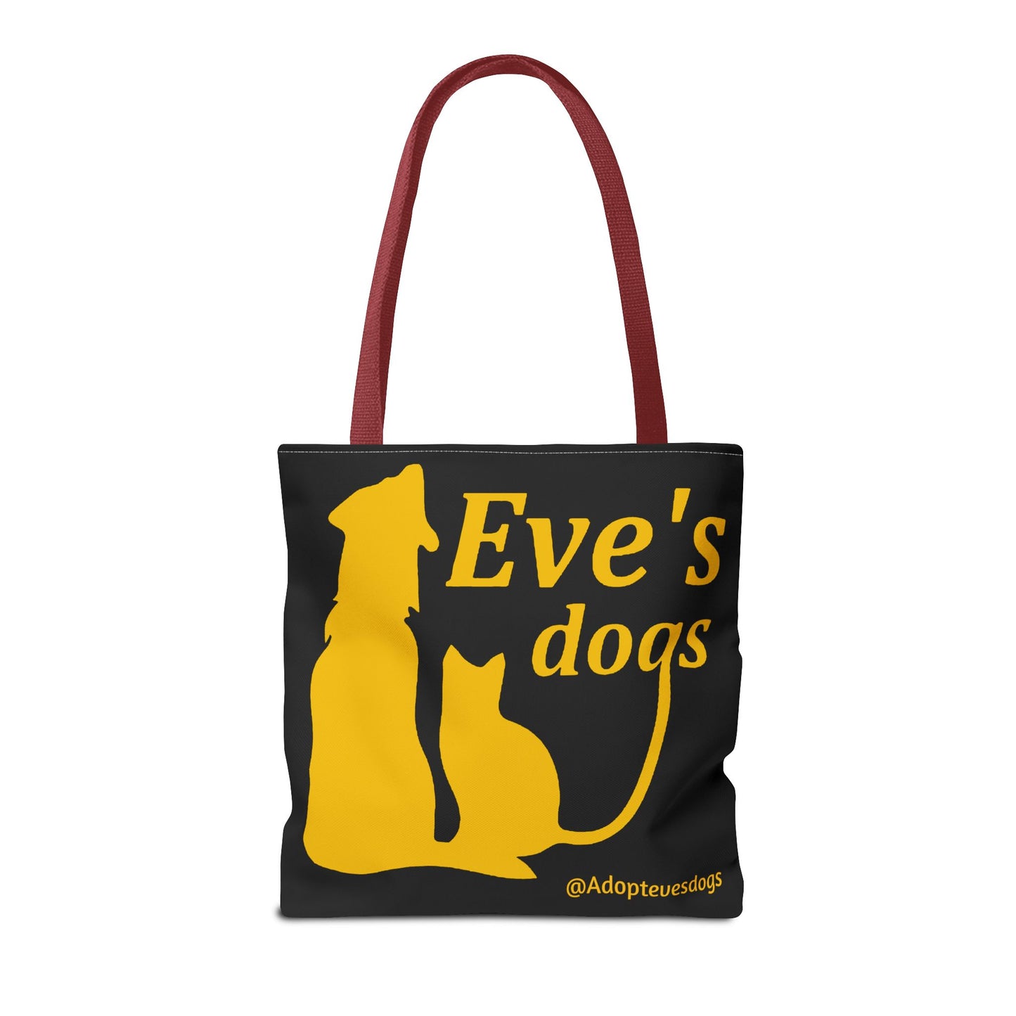 This is the Red 16" x 16" Adopt Eve's Dog Tote Bag. This is the front image of the tote. The handles are red. The top of the tote is hemmed in yellow. The tote is all over black with the image of a dog, cat, "Eve's Dogs" and "@Adoptevesdogs" in yellow. The tote is against an all white background.