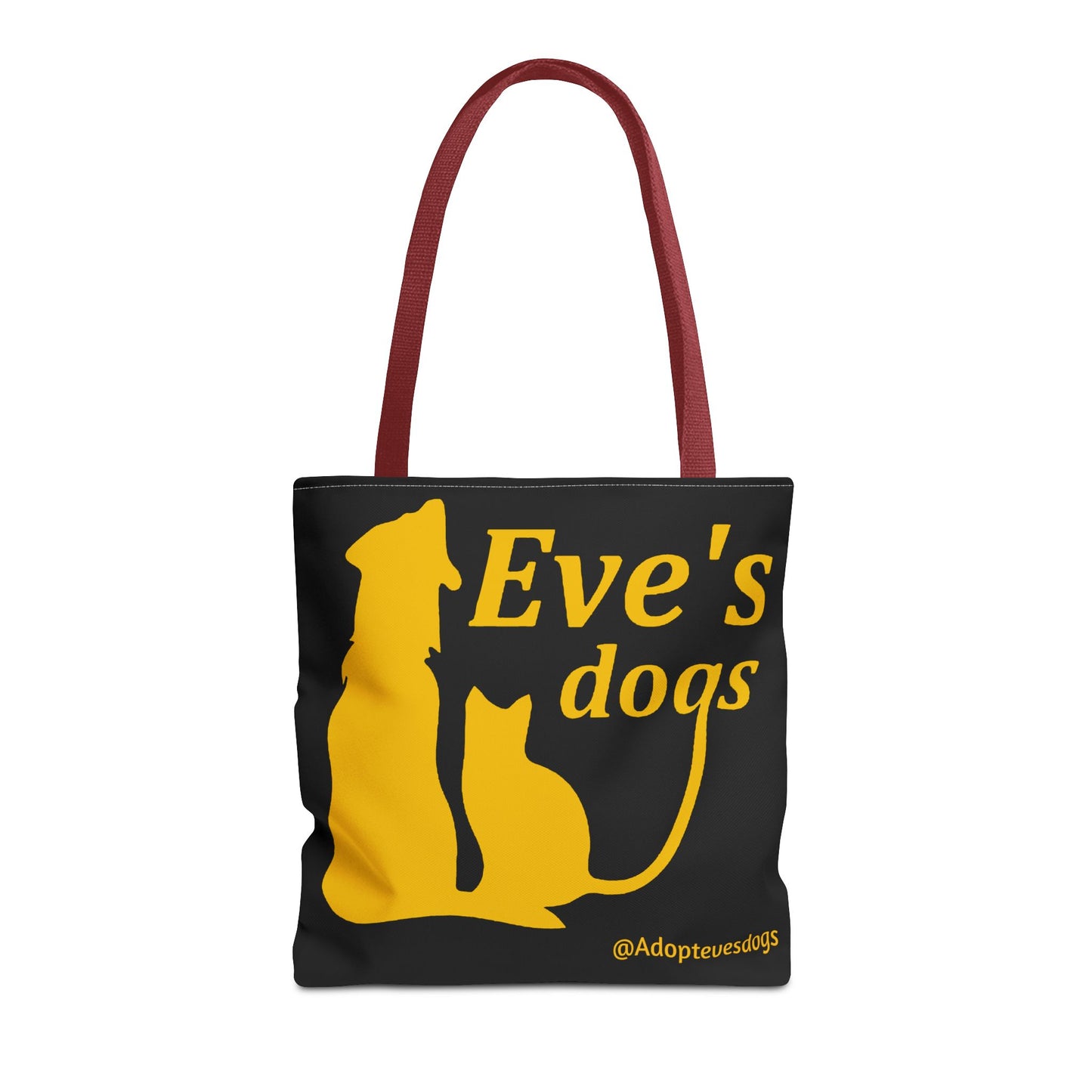 This is the Red 16" x 16" Adopt Eve's Dog Tote Bag. This is the front image of the tote. The handles are red. The top of the tote is hemmed in yellow. The tote is all over black with the image of a dog, cat, "Eve's Dogs" and "@Adoptevesdogs" in yellow. The tote is against an all white background.