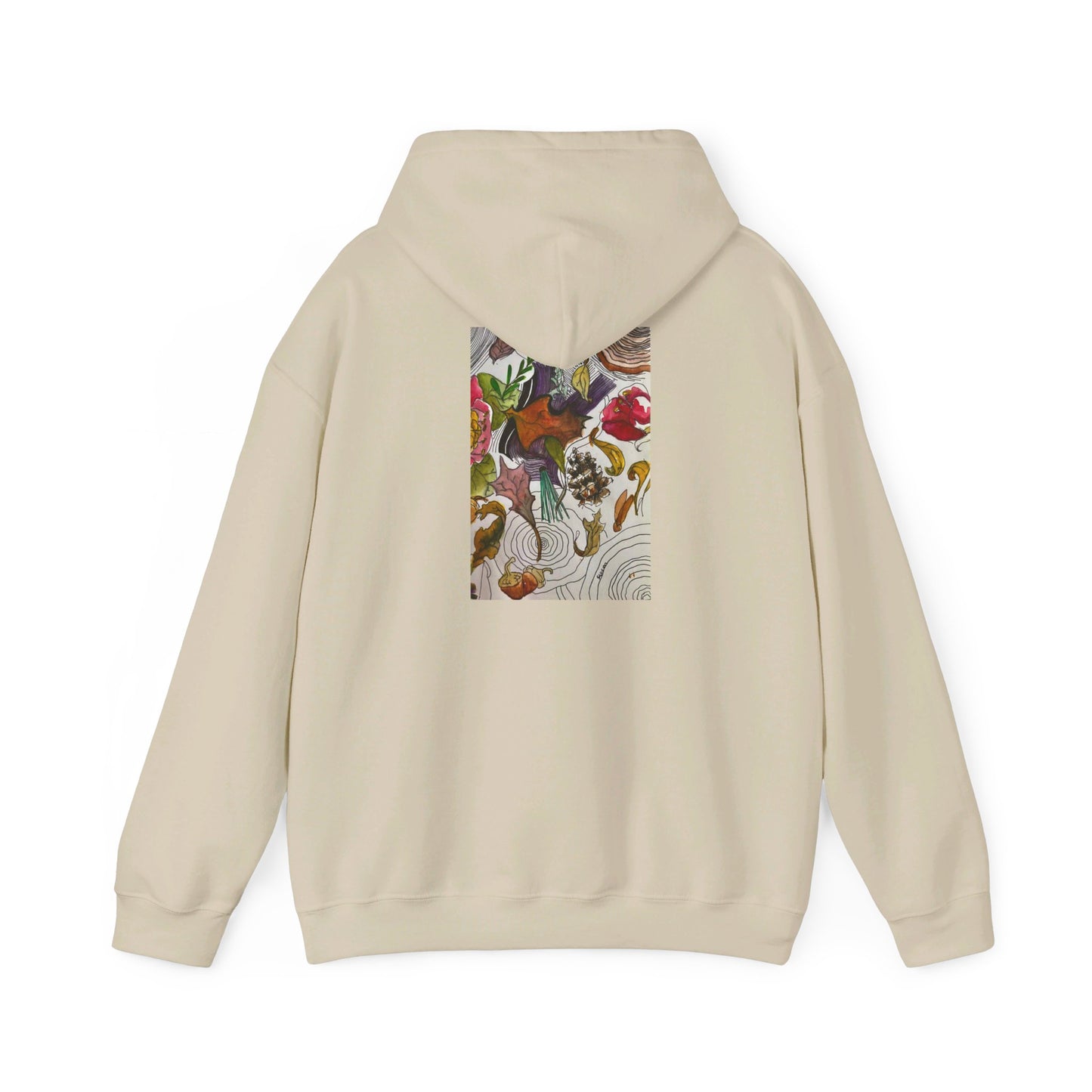 This is the Sand Fall is falling Heavy Blend Hooded Sweatshirt by Storm Garden Studio. It comes in sizes S-5XL. The image is from the back with the hood down. The drawstring is color matched. The illustration is within a rectangle starting from the upper back to mid back. There are various conifers like leaves,pine cones,etc. There are also some flowers and a tree trunk ring.The colors are red, yellow, dark brown, purples, and green. It is against from a white background.