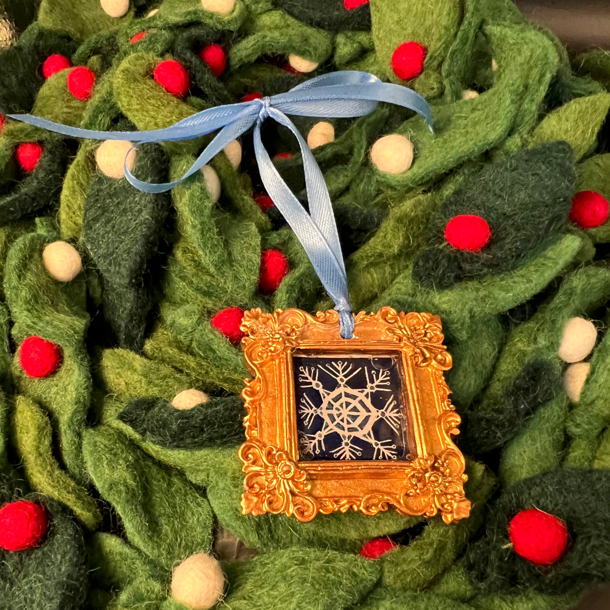 CFD Snowflake Fine Line Ornament by The Art Collective International, clear glass with intricate white snowflake engraving