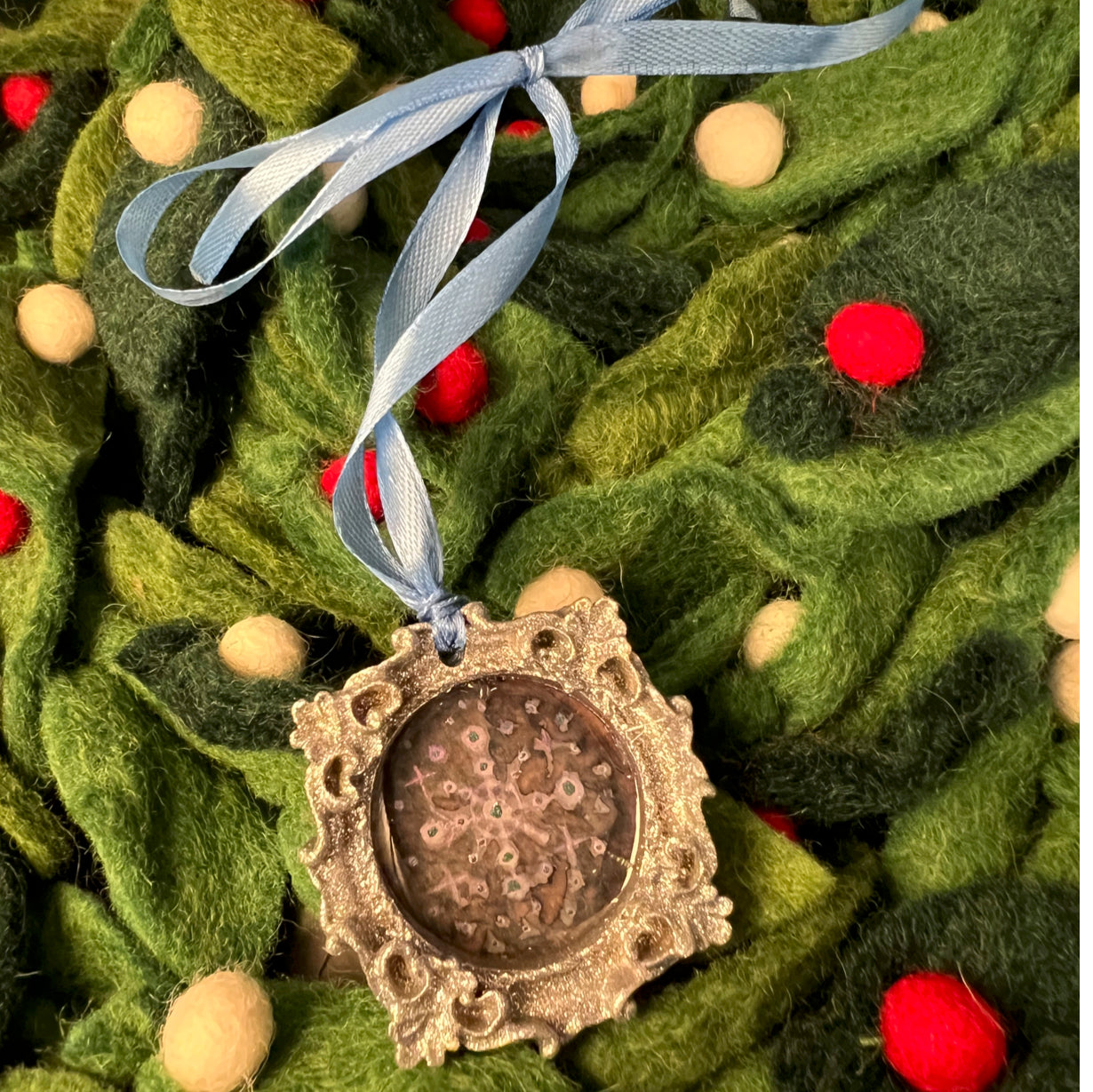 CFD Modern Snowflake Ornament by The Art Collective International in clear glass with embossed geometric patterns and 2-inch