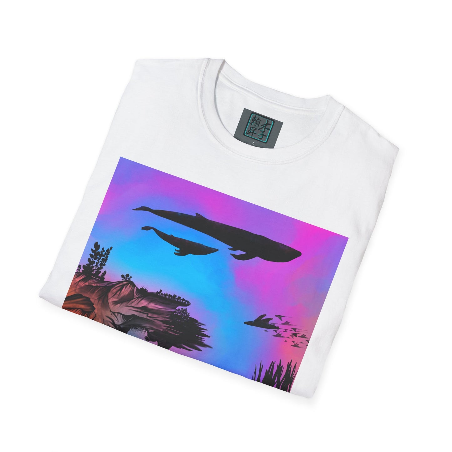This is the White Into the Abyss Softstyle T-Shirt by Lee Hansheng Studios. This shows the front of the shirt folded. The illustration is underwater seascape with aquatic plants on a marbled background. What can be seen is the two blue whales and a school of fish. The inside of the shirt has a gray label with the studio logo and the size label underneath printed in white. The shirt is against a white background.