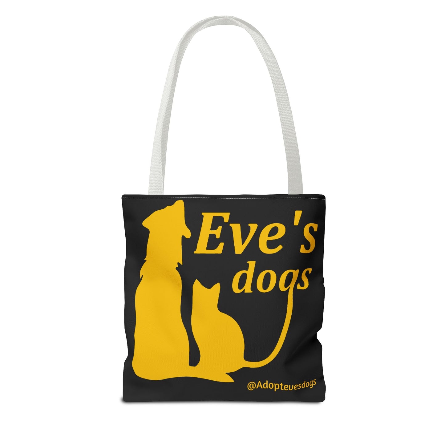 This is the White 13" x 13" Adopt Eve's Dog Tote Bag. This is the front image of the tote. The handles are white. The top of the tote is hemmed in yellow. The tote is all over black with the image of a dog, cat, "Eve's Dogs" and "@Adoptevesdogs" in yellow. The tote is against an all white background.