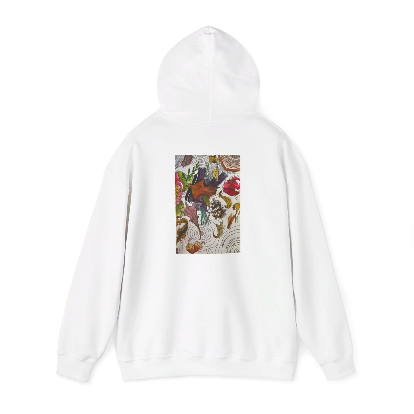 This is the White Fall is falling Heavy Blend Hooded Sweatshirt by Storm Garden Studio. It comes in sizes S-5XL. The image is from the back with the hood up to show the shoulder area. The drawstring is color matched. The illustration is within a rectangle starting from the upper back to mid back. There are various conifers like leaves,pine cones,etc. There are also some flowers and a tree trunk ring.The colors are red, yellow, dark brown, purples, and green. It is against from a white background.