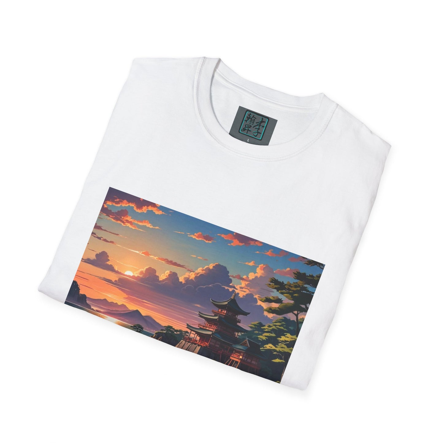 This is the White Temple of Peace Softstyle T-Shirt by Lee Hansheng Studios. It comes in sizes S-5XL. This is an image of the shirt from the front and folded. On the inside of the shirt there is the studio's logo. The illustration shows the top of the landscape. There is a setting red/orange sun above clouds, one blue roof,brown/red walled temples on the right thre are some trees and mountains in the background scenery. The t-shirt is against a white background.