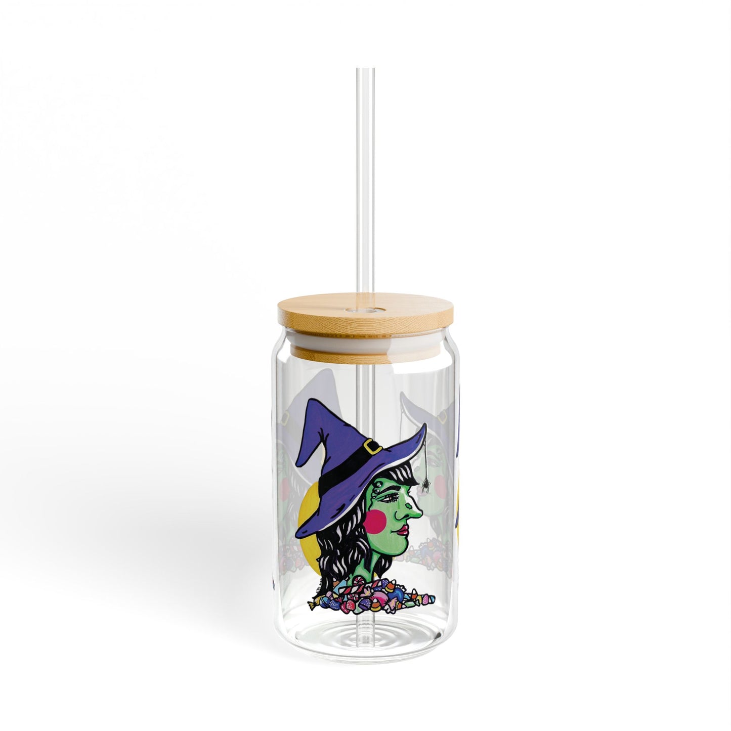 This is the 16oz Witch Sipper Glass with light colored bamboo lid and with straw to the front. It is a side profile image of a witch printed all around. She is facing the left side,has a purple witch hat with a black belt,yellow buckle, a spider crawling down the front,red rosy cheeks,red lips and assorted candy under the illustration by the neck. Behind her is a bright yellow circle past her hair.The colors of the candy are red, white, orange, blue and purple.It is against a white background.