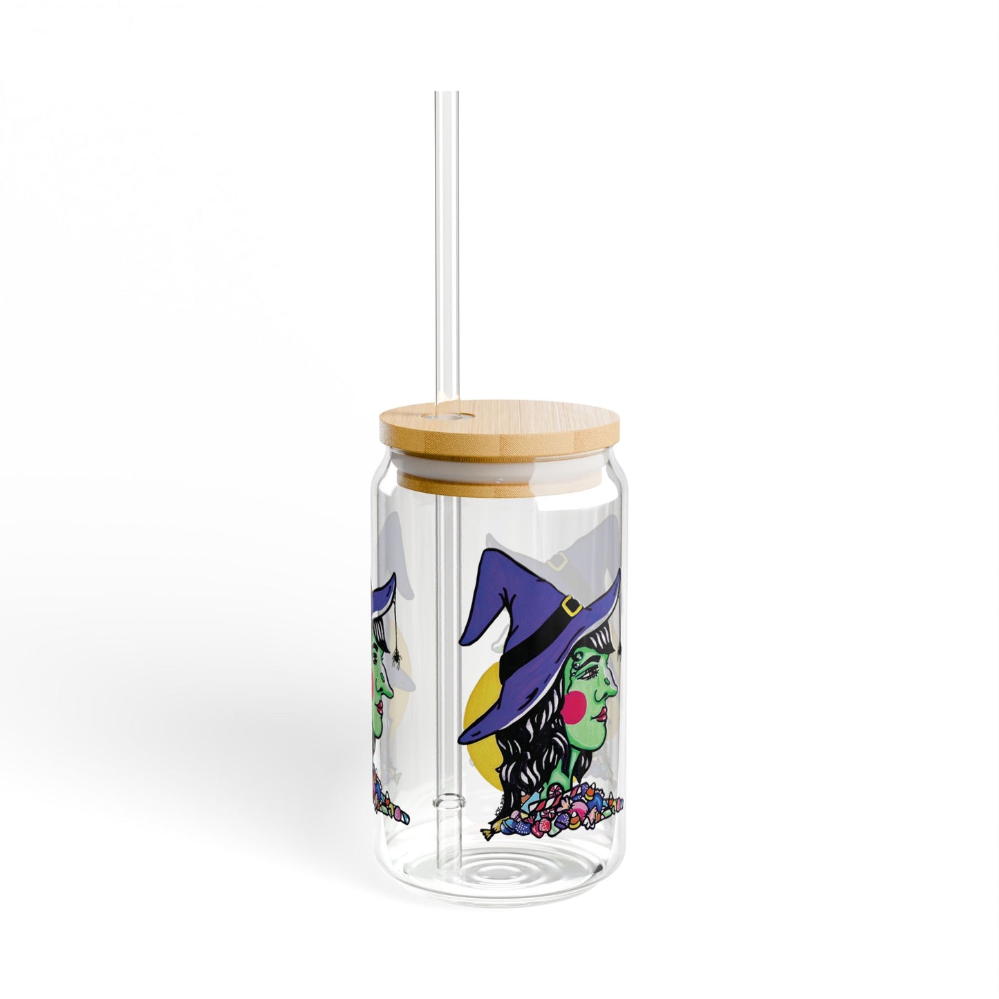 This is the 16oz Witch Sipper Glass with light colored bamboo lid and with straw slightly to the left. It is a side profile image of a witch printed all around. She is facing the left side,has a purple witch hat with a black belt,yellow buckle, a spider crawling down the front,red rosy cheeks,red lips and assorted candy under the illustration by the neck. Behind her is a bright yellow circle past her hair.The colors of the candy are red, white, orange, blue and purple.It is against a white background.