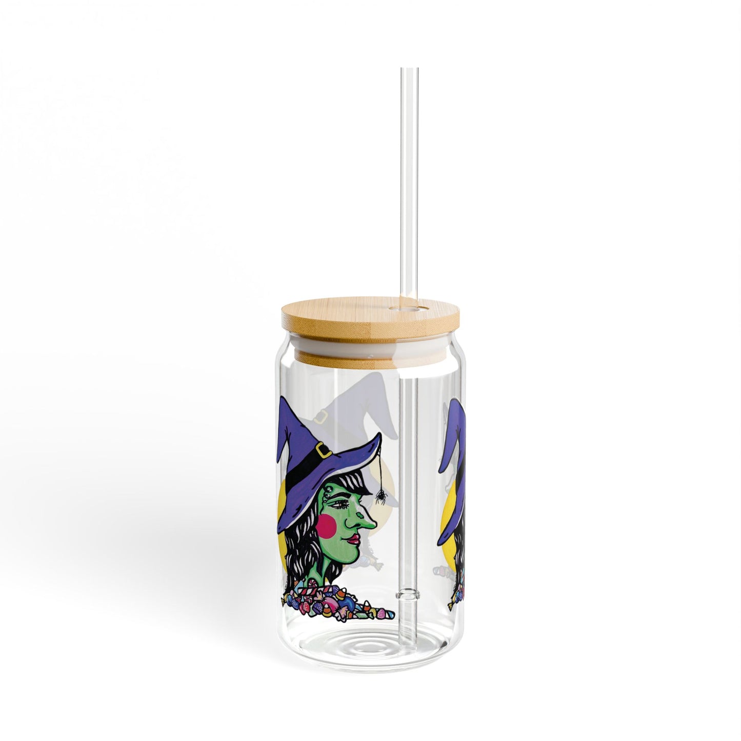 This is the 16oz Witch Sipper Glass with light colored bamboo lid and with straw slightly to the right. It is a side profile image of a witch printed all around. She is facing the left side,has a purple witch hat with a black belt,yellow buckle, a spider crawling down the front,red rosy cheeks,red lips and assorted candy under the illustration by the neck. Behind her is a bright yellow circle past her hair.The colors of the candy are red, white, orange, blue and purple.It is against a white background.