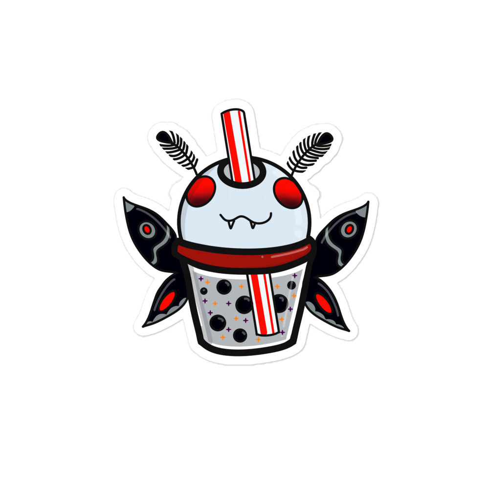 Close-up of the Mothman Boba sticker showcasing vibrant purple, green, and black ink details on glossy vinyl surface with