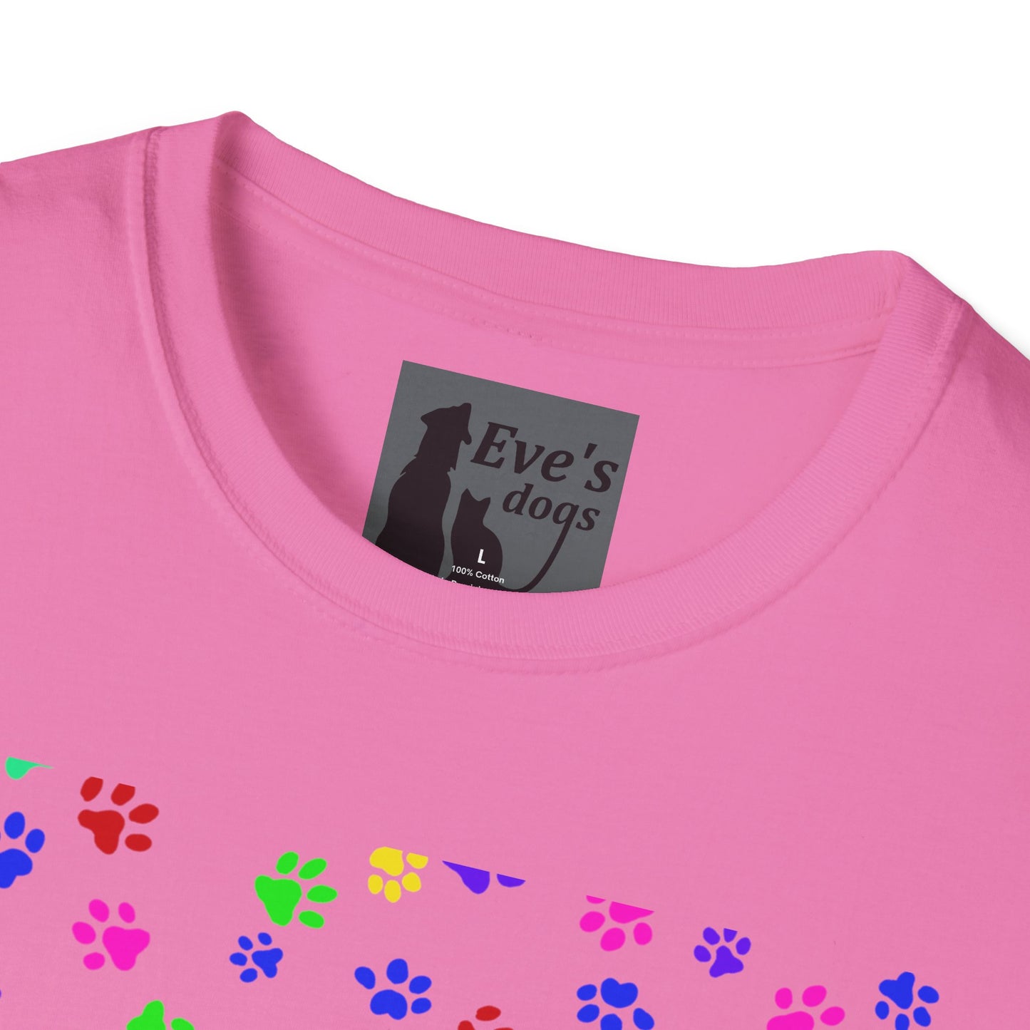 This is the Azalea Adopt Eve's Dogs T-Shirt. It comes in XS - 5XL. This is an upclose image of the shirt where the neck/tag is. The size label is a grey and black tag with a dog and cat with the "Eve's dogs" writing. The sizes and shirt product materials are printed in white. There is a little bit of paw prints on the front.  The colors are pink, green, blue, purple, red paw prints in different sizes. It is against a white background.