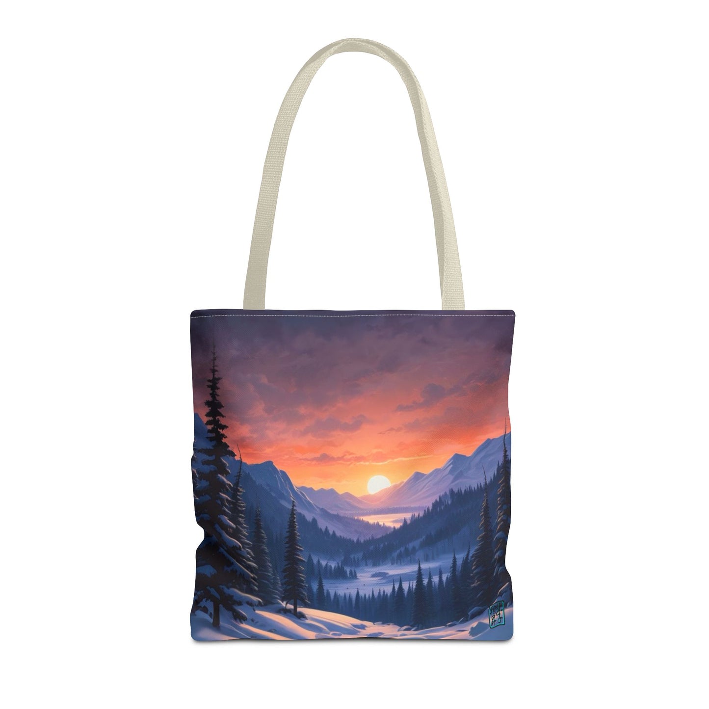 The Beige 16" x 16" Snow Valley Tote Bag has color matched handles and all around print. The tote is against a white background.The design by Lee Hansheng Studios showcases a snowy hill/mountain area with large pine trees on both sides continuing into the horizon. The sun rises past the horizon consisting of yellow,orange,red hues illuminating onto wispy clouds,snowy field, mountains and dark green pine trees. 