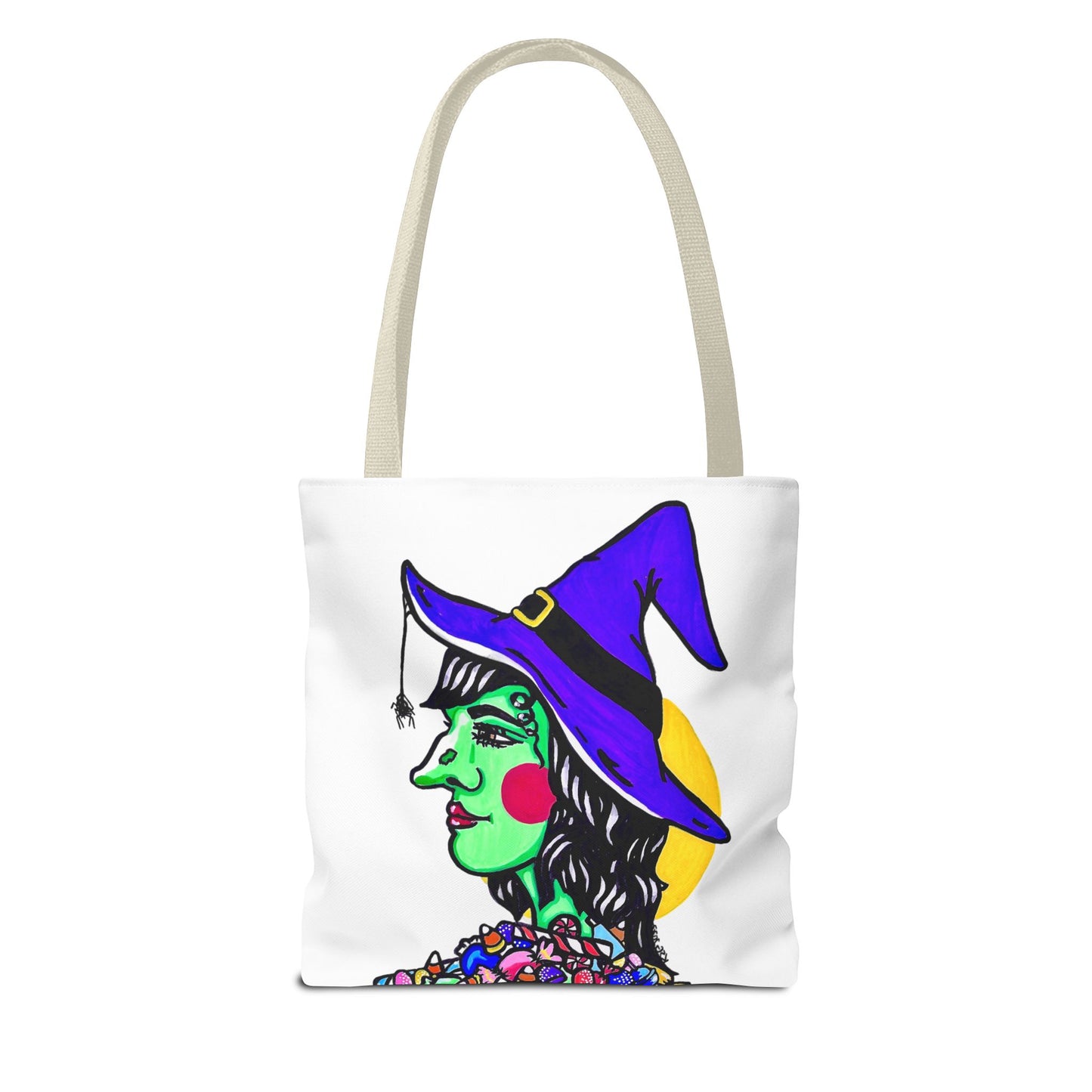 This is the Beige 13" x 13" Witch Tote Bag by Storm Garden Studio. The handles are color matched. The tote is all over white except for the illustration. It shows the side profile image of a witch. She is facing the left side. She has a purple witch hat with a black belt, yellow buckle, a spider crawling down the front, red rosy cheeks, red lips and assorted candy under the neck. Behind her is a bright yellow circle past her hair. The tote is against a white background.