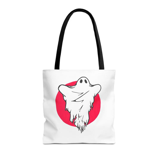 This is the Black 16" x 16" Ghost Tote Bag by Storm Garden Studio. The handles are black too. The tote itself is white all over with the illustration in the middle. The white ghost is in the middle with its arms up, the cloth over it is wrinkled and ragged. Centered behind the ghost is a red circle. It is against a white background.
