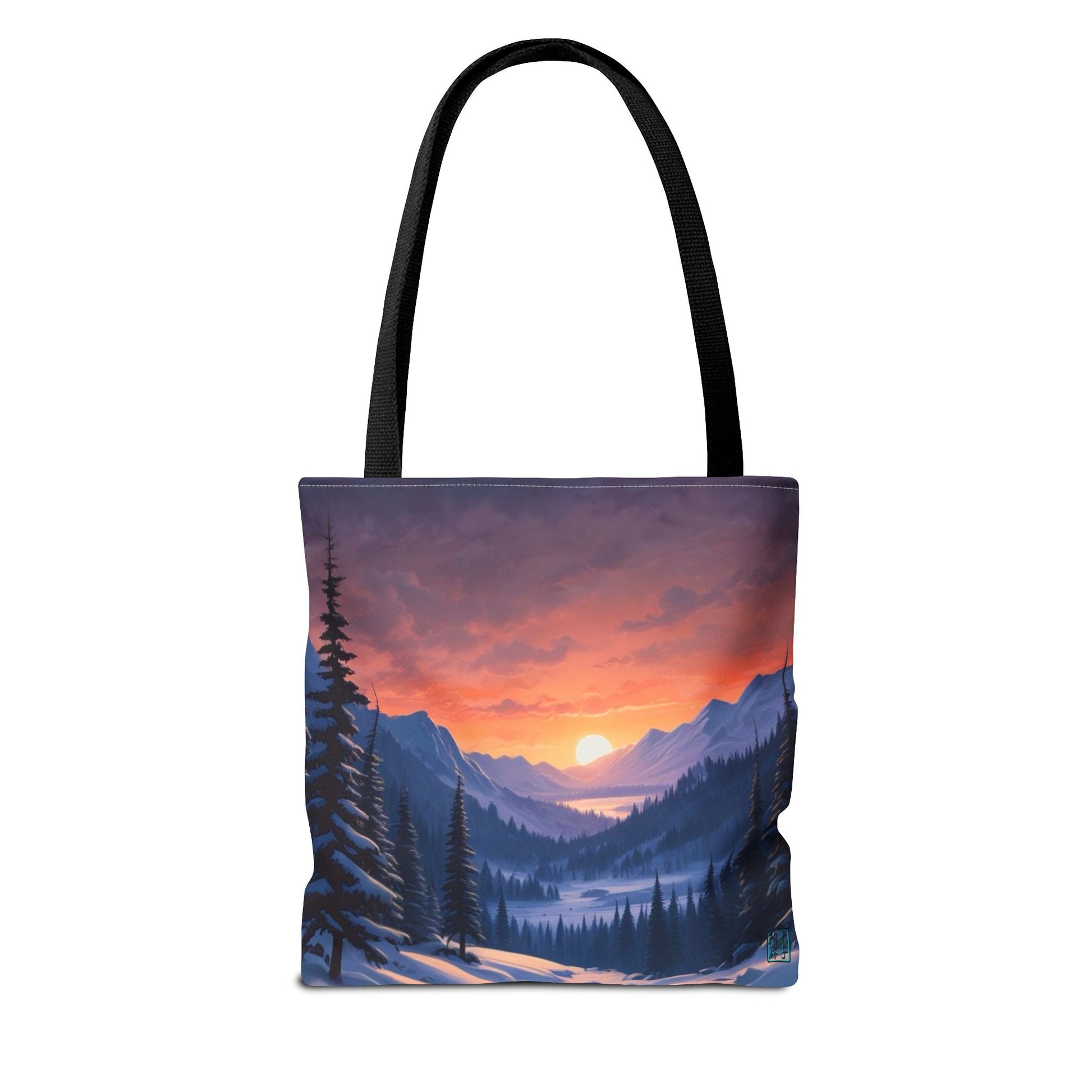 The Black 13" x 13" Snow Valley Tote Bag has color matched handles and all around print. The tote is against a white background.The design by Lee Hansheng Studios showcases a snowy hill/mountain area with large pine trees on both sides continuing into the horizon. The sun rises past the horizon consisting of yellow,orange,red hues illuminating onto wispy clouds,snowy field, mountains and dark green pine trees. 