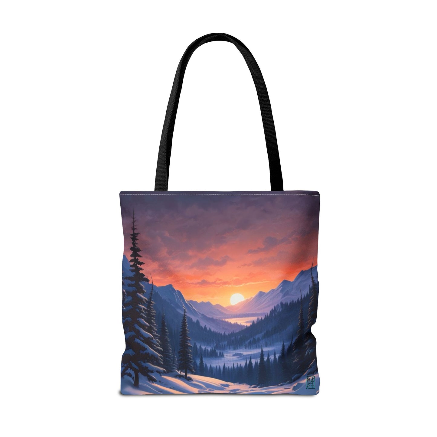 The Black 18" x 18" Snow Valley Tote Bag has color matched handles and all around print. The tote is against a white background.The design by Lee Hansheng Studios showcases a snowy hill/mountain area with large pine trees on both sides continuing into the horizon. The sun rises past the horizon consisting of yellow,orange,red hues illuminating onto wispy clouds,snowy field, mountains and dark green pine trees. 