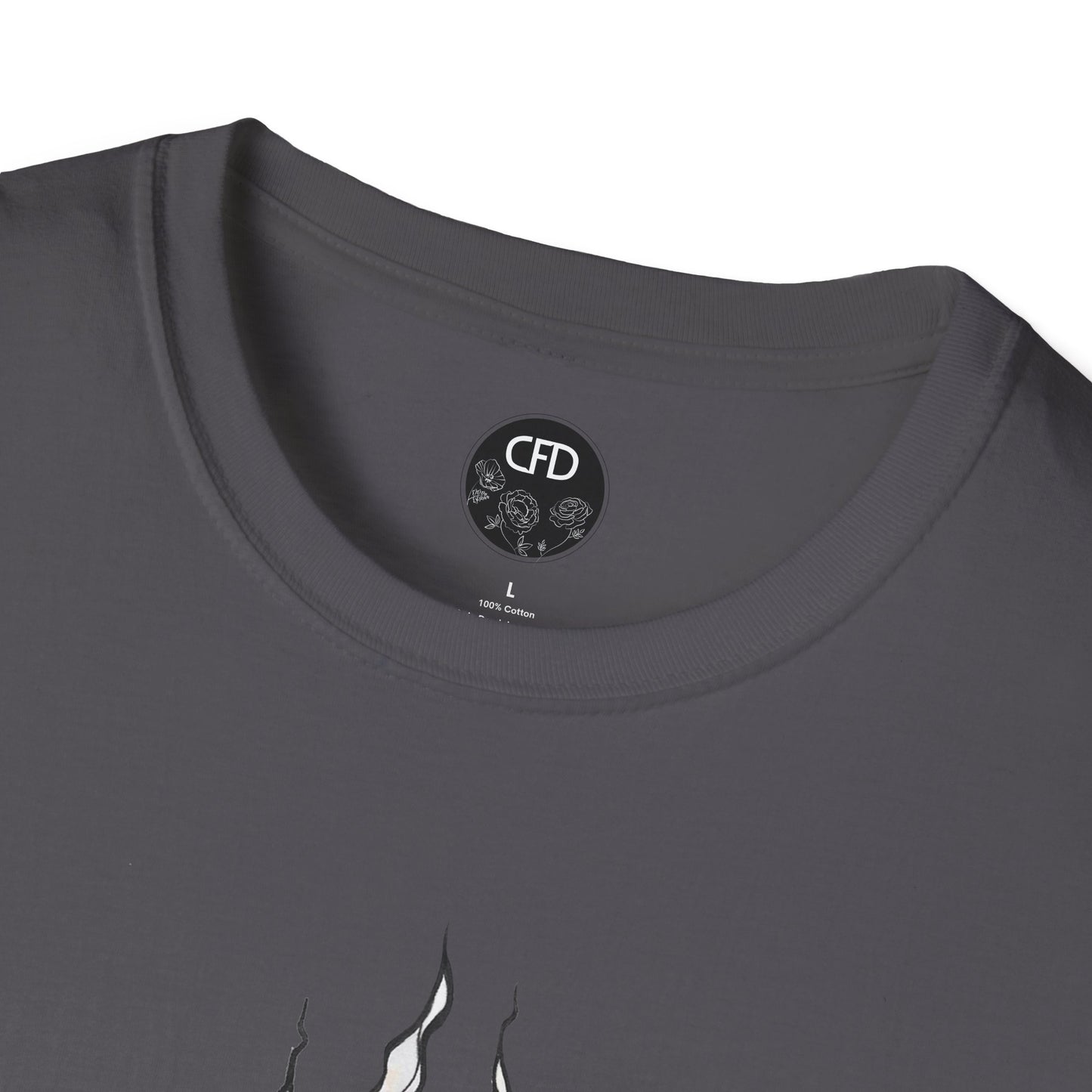 This is the Charcoal English Breakfast Tea T-Shirt by Chris Foster Design. It comes in sizes XS-5XL. This is a close up of the front with a circular CFD logo in white lettering and black background. The CFD logo and white flowers surrounding the bottom of the lettering. The size label is below the logo in black. From the closeup a little bit of the illustration is white wisps. The image is against a white background.