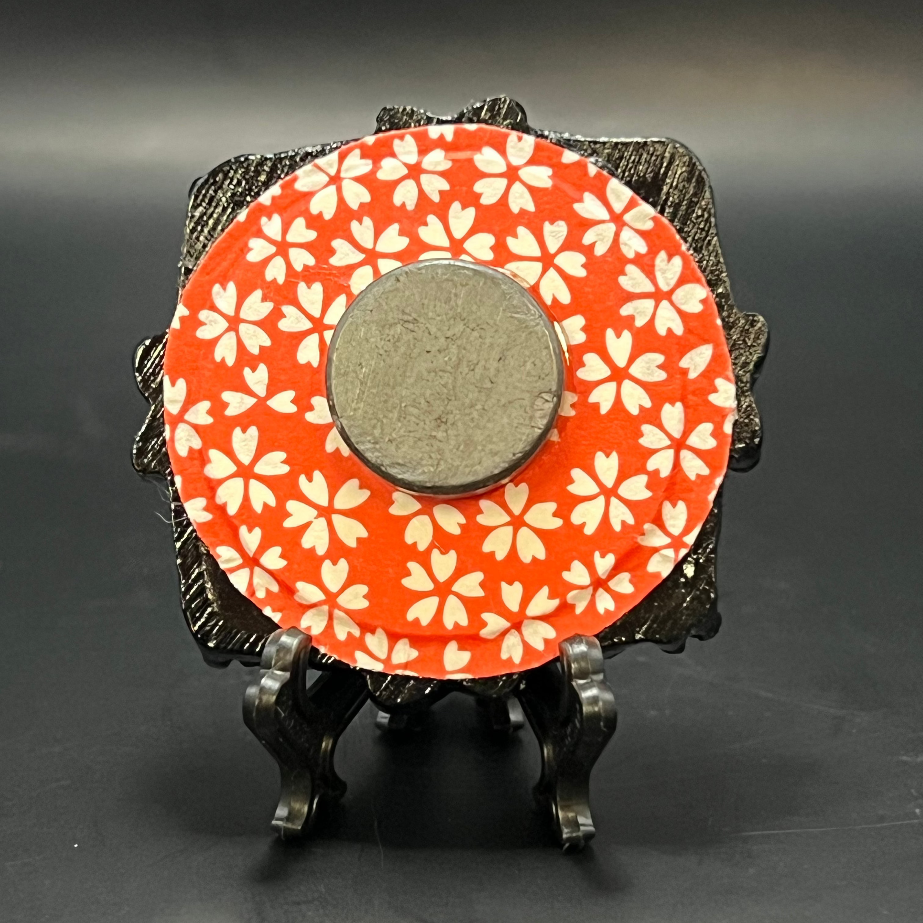 Close-up of the textured brushstrokes highlighting delicate cherry blossom petals and vibrant pink hues in the mini painting.