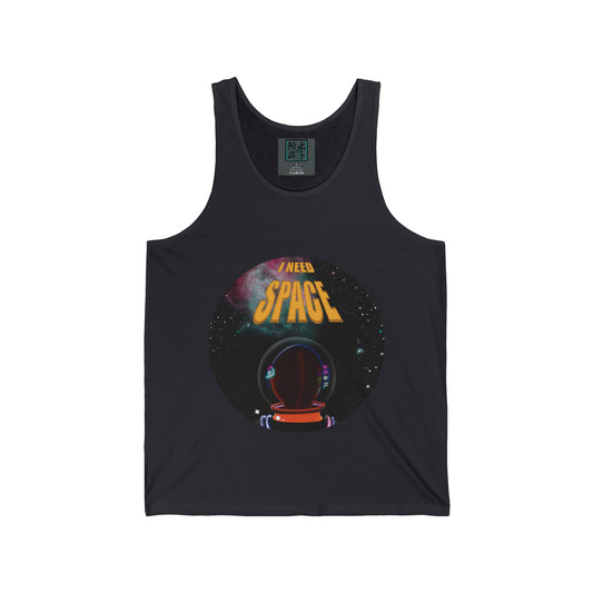 This is the Dark Grey I NEED SPACE Jersey Tank by Lee Hansheng Studios. It comes in sizes XS-2XL. This is the front of the tank with a round illustration, yellow writing that says "I NEED SPACE", a starry sky that is black, a nebula colored blue and pink, white stars spread throughout and an astronaut wearing an orange jumpsuit staring at the stars and letters. The tank is against a white background.