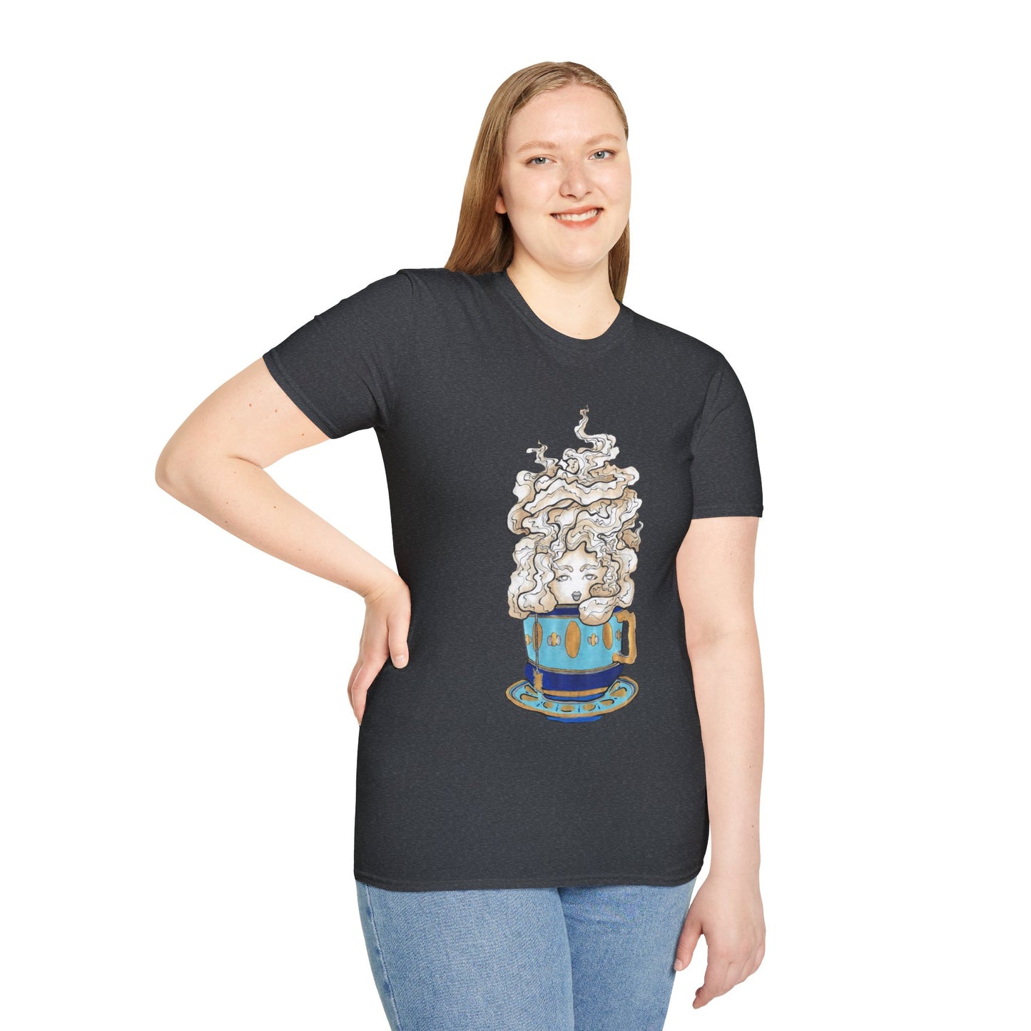 This is the Dark Heather Grey Earl Grey Softstyle T-Shirt by Chris Foster Design. It comes in sizes XS-5XL. The illustration is of a gold, light blue and dark blue teacup with a tan, yellow and white steam. The steam is swirly and goes up and outwards. In the middle is a lady's face. A smiling lady facing the front with her head tilted slightly to the left, hair behind shoulders, right hand on waist, other hand hanging naturally and is wearing dark jeans and the designed t-shirt. 