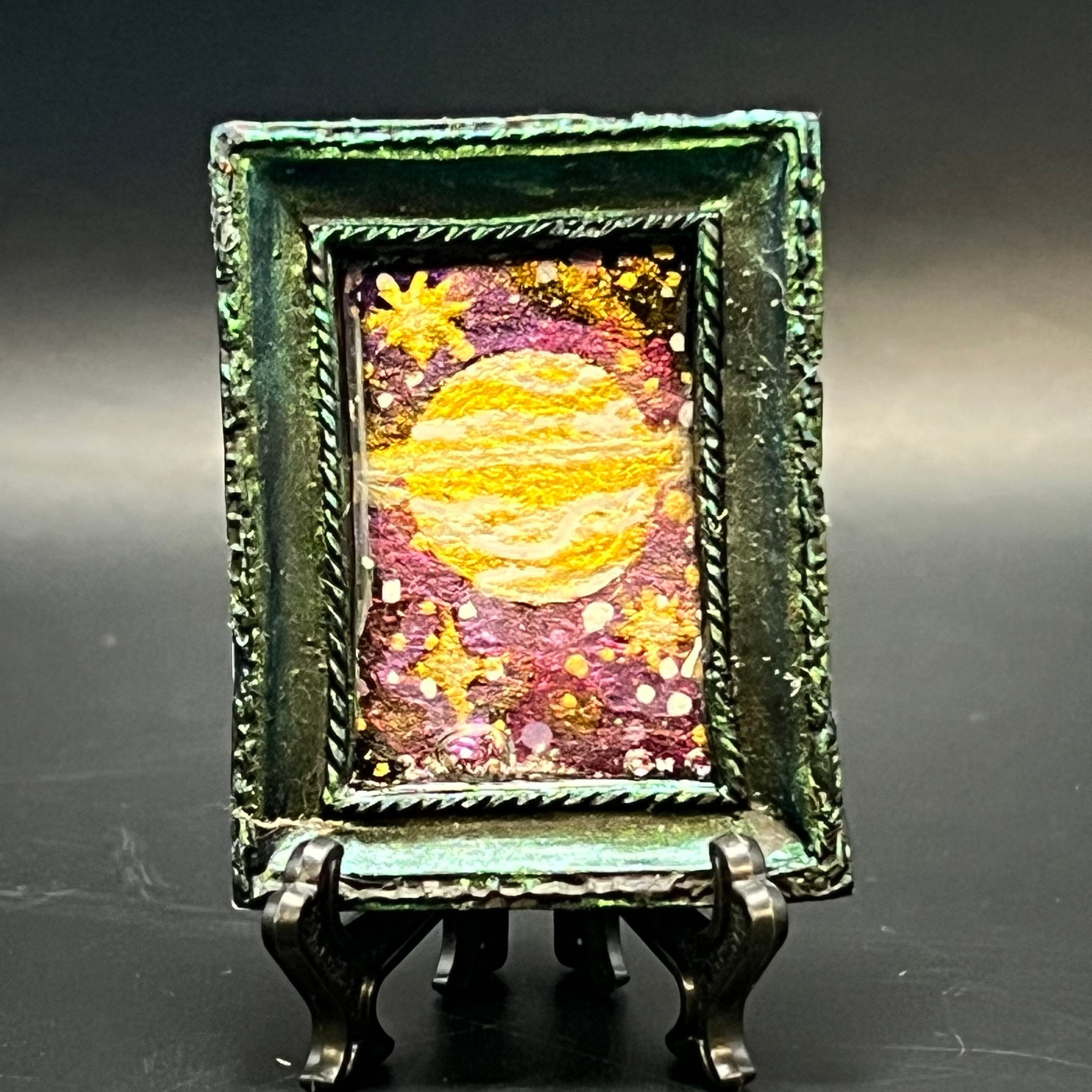 The Art Collective International CFD Distant Ringed Planet mini painting jewelry featuring sterling silver setting, cubic