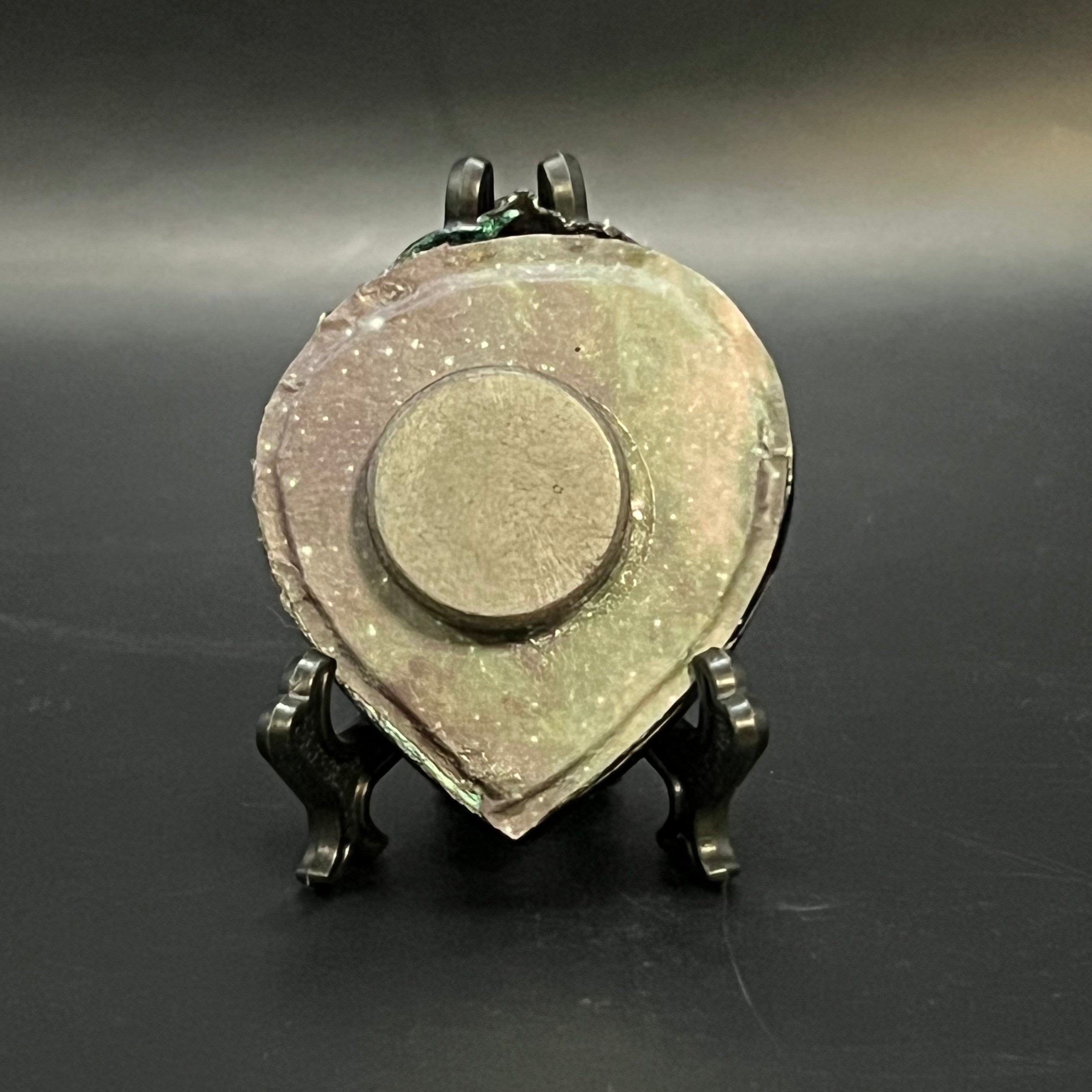 Close-up of glowing cluster texture with miniature brushstrokes and vibrant color blending in a 4x4 inch framed artwork.